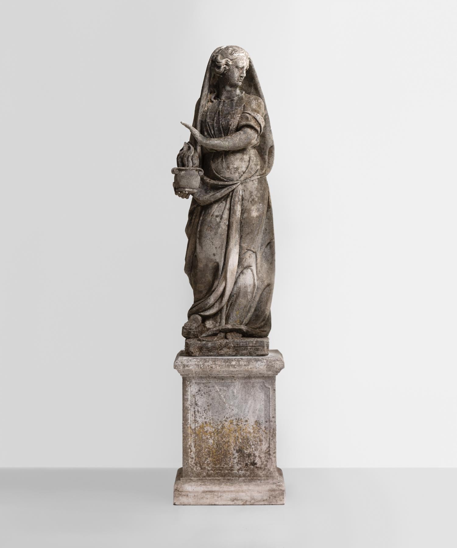 Cast stone garden statue, Italy, circa 1930.

Statue of a female archetypal figure. Beautifully weathered and elevated on a simple base.