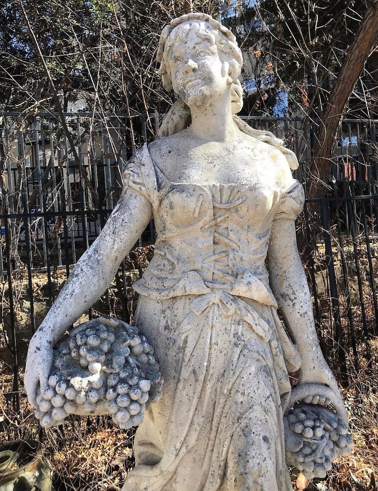 Magnificent set of four garden cast stone maiden sculptures depicting the four seasons. Each raised on a companion pedestal base.

Amazing detail!

Wonderful weathered look.

Lifesize! Perfect for garden or poolside elegance.

Measure: Bases