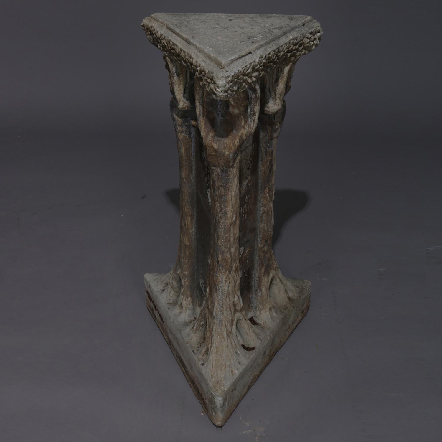 A cast stone naturalist sundial pedestal features elements of baroque and Rococo with trunk and stick form and having Gothic figures, 20th century.

Measures: 40