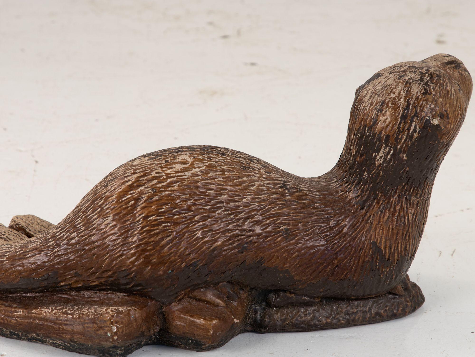 Steingut-Otter aus Guss (Englisch)