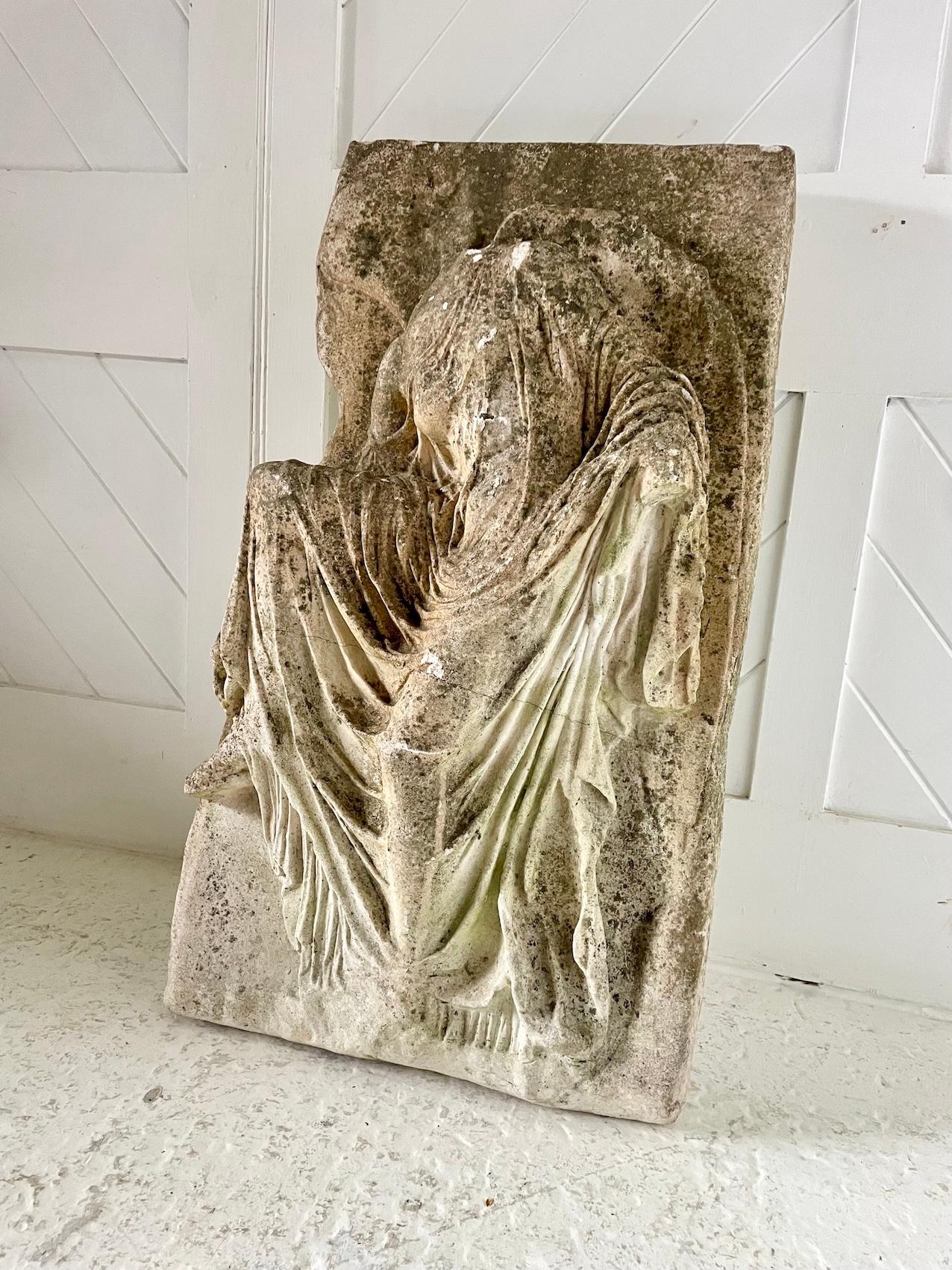 Early 20th Century Cast Stone Relief Panel Depicting 'Nike' Adjusting Her Sandal For Sale