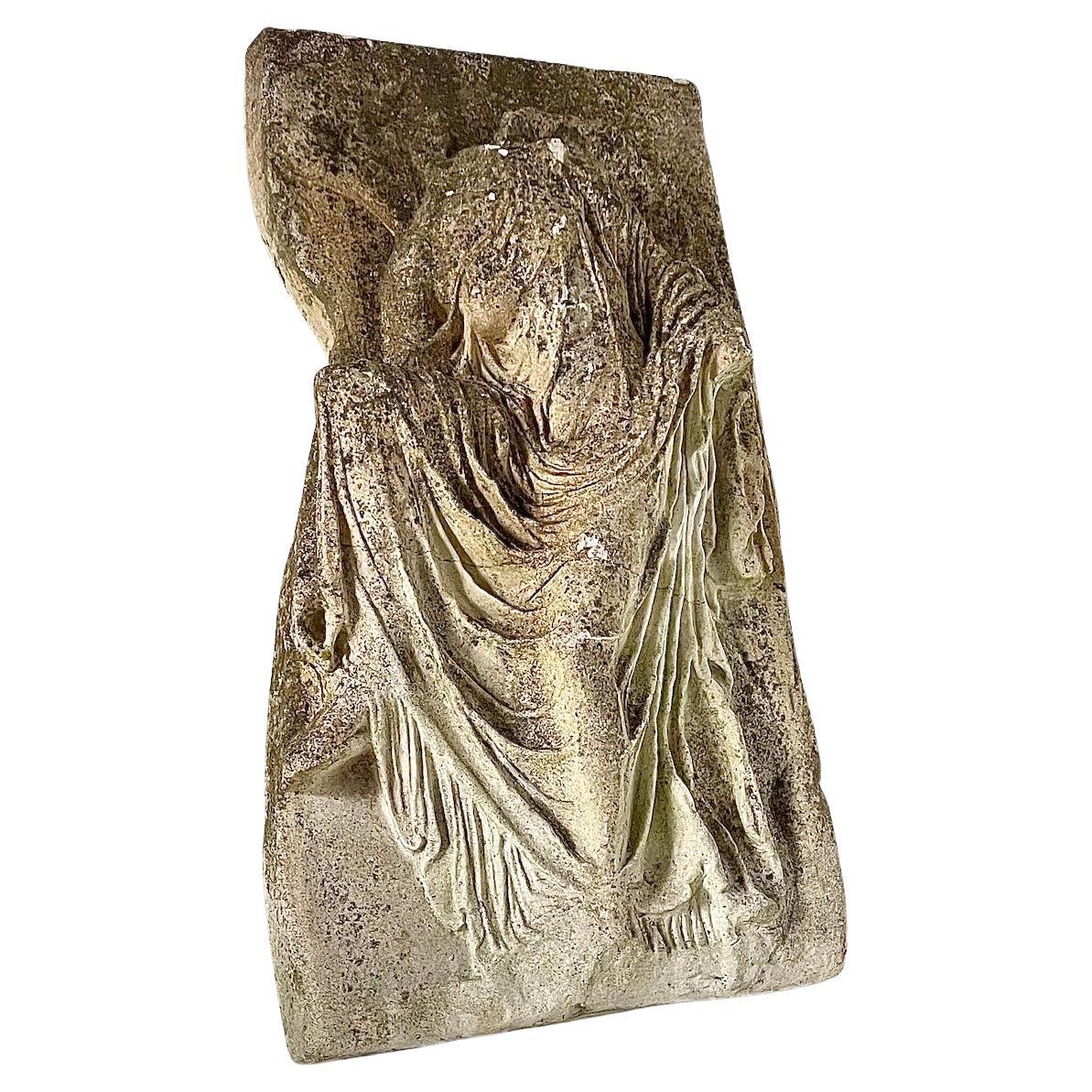 Cast Stone Relief Panel Depicting 'Nike' Adjusting Her Sandal For Sale