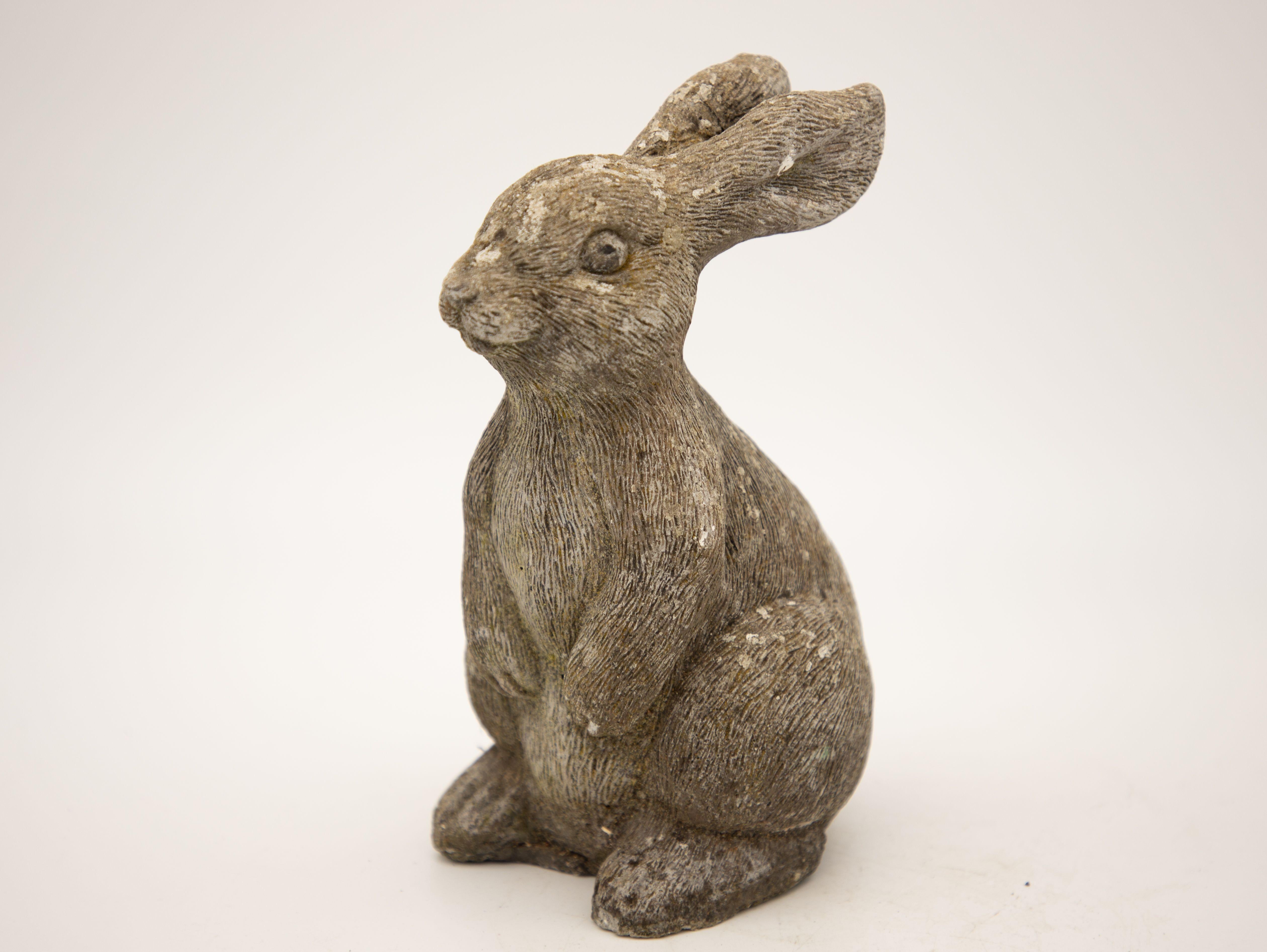 Cast stone sitting rabbit garden ornament from the mid-century. Realistic fur and lovely shape to the ears.