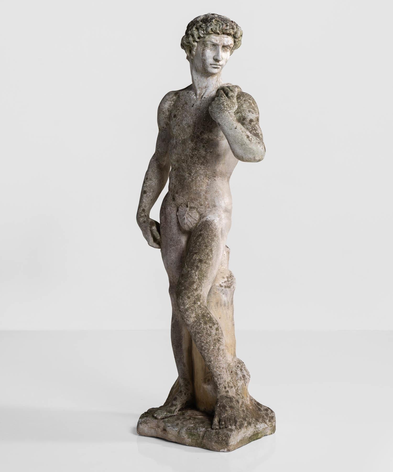 Cast stone statue, France, circa 1900.

With a beautiful patina in the style of Michelangelo's David.