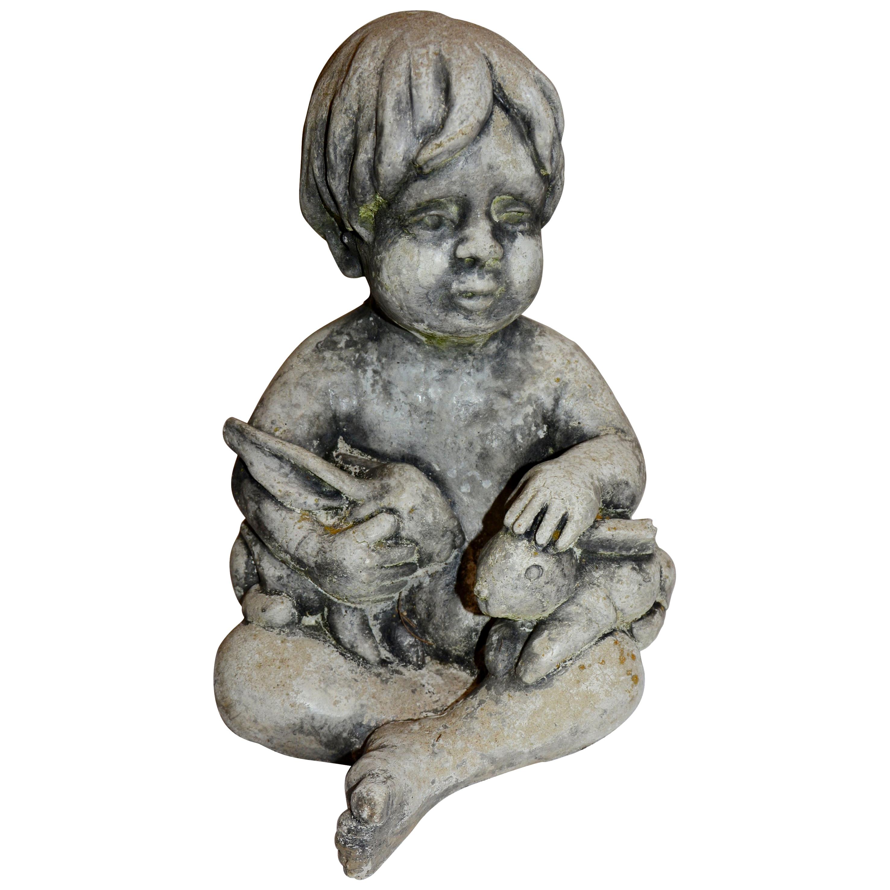 Cast Stone Statue of Baby Holding Bunnies For Sale