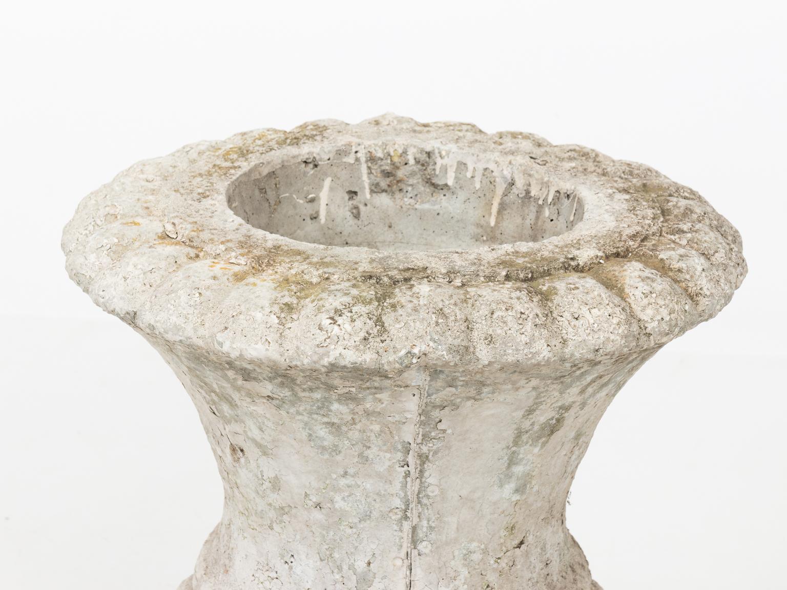 Cast stone ornamental garden urn with faux finish, circa 20th century. This piece weighs between 40 and 70 LBS.
 