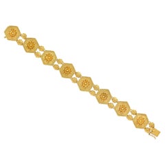 Castellani, bracciale in filigrana a stazione unica in oro giallo 15k, 7,25".