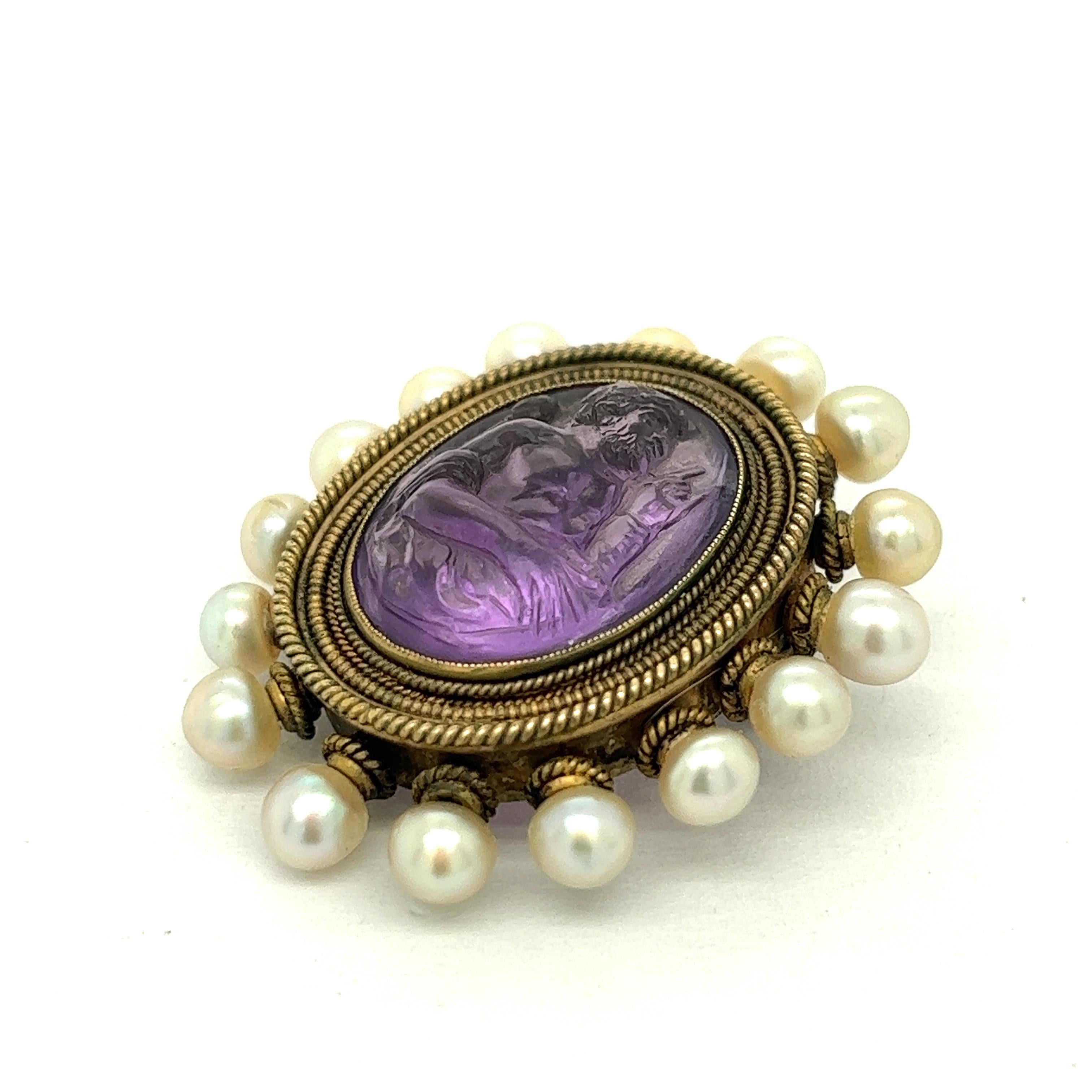 Castellani Amethyst Cameo Pearl Oval 18k Gold Brooch

One carved amethyst cameo (14.5 x 18 mm) set on 18 karat yellow gold with various shaped pearls (4.5 to 4.6 mm); marked with personal engraving (MBF) and maker's mark

Size: width 1.25 inches,