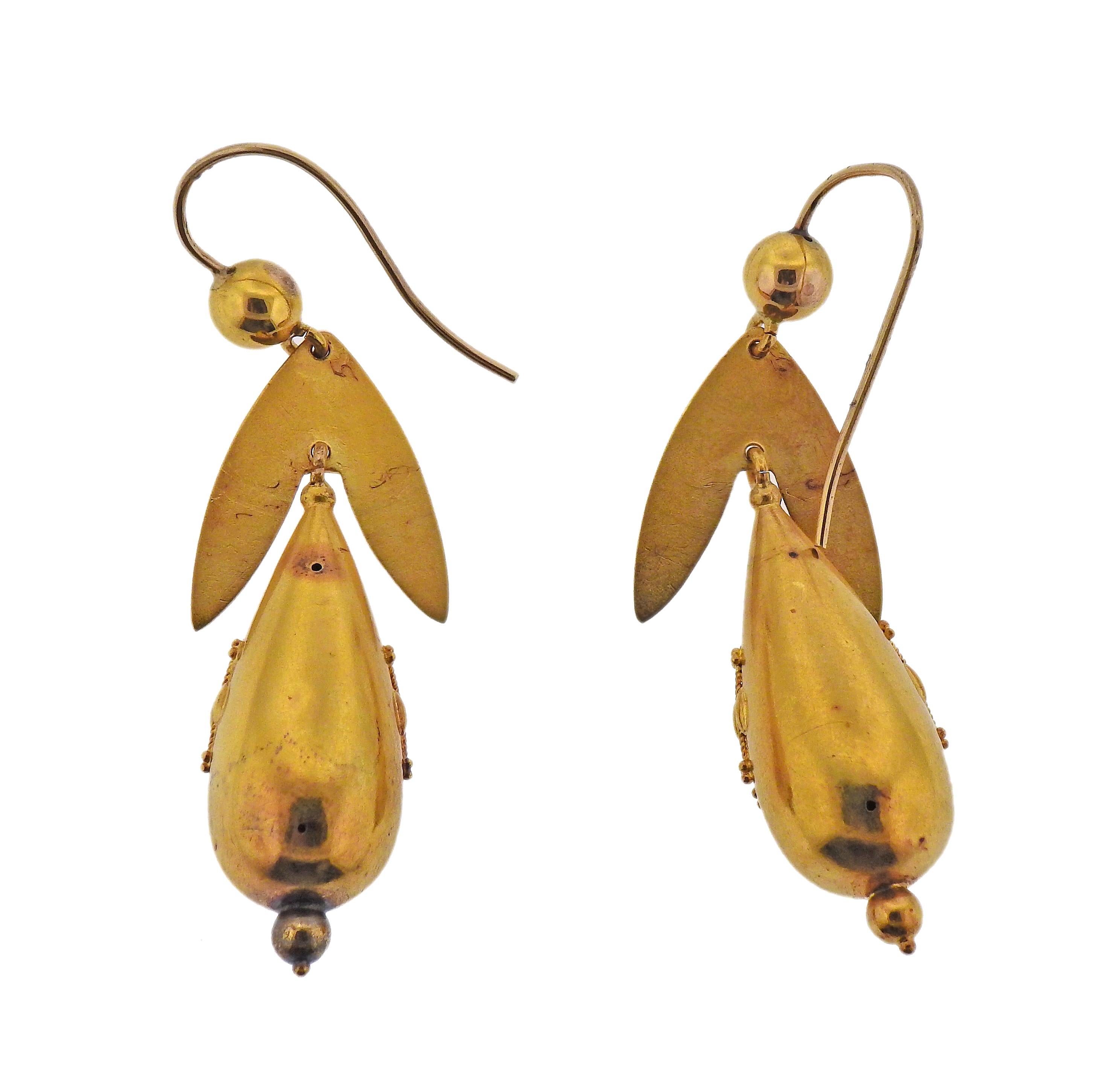 Pair of 15k yellow gold drop earrings by Castellani. Earrings measure 2