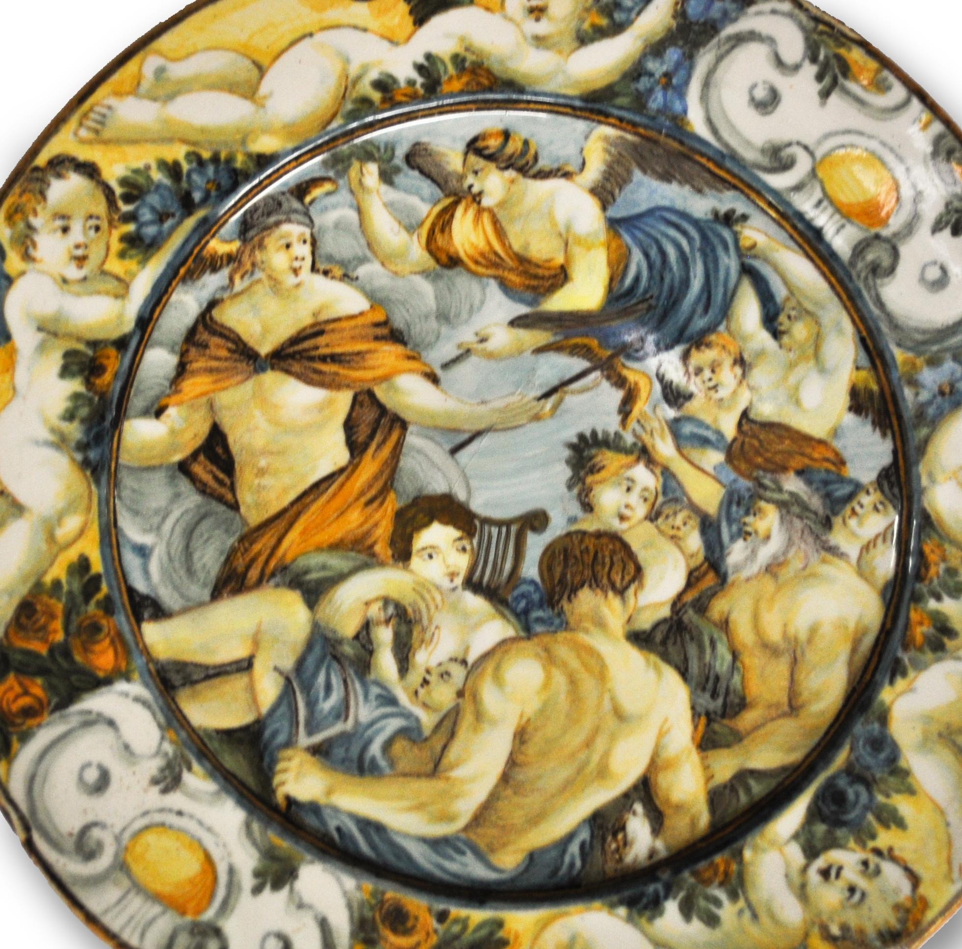 This Castelli ceramic plate is a superb colored ceramic plate with a pagan scene.

In excellent conditions, with vivid colors. 

The ceramic art of Castelli, in Abruzzo, has ancient origins but became famous in the sixteenth century. 

It was