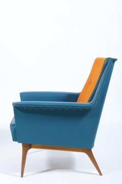 Coppia di poltrone firmate Castelli del Medioevo con tappezzeria originale arancio-blu