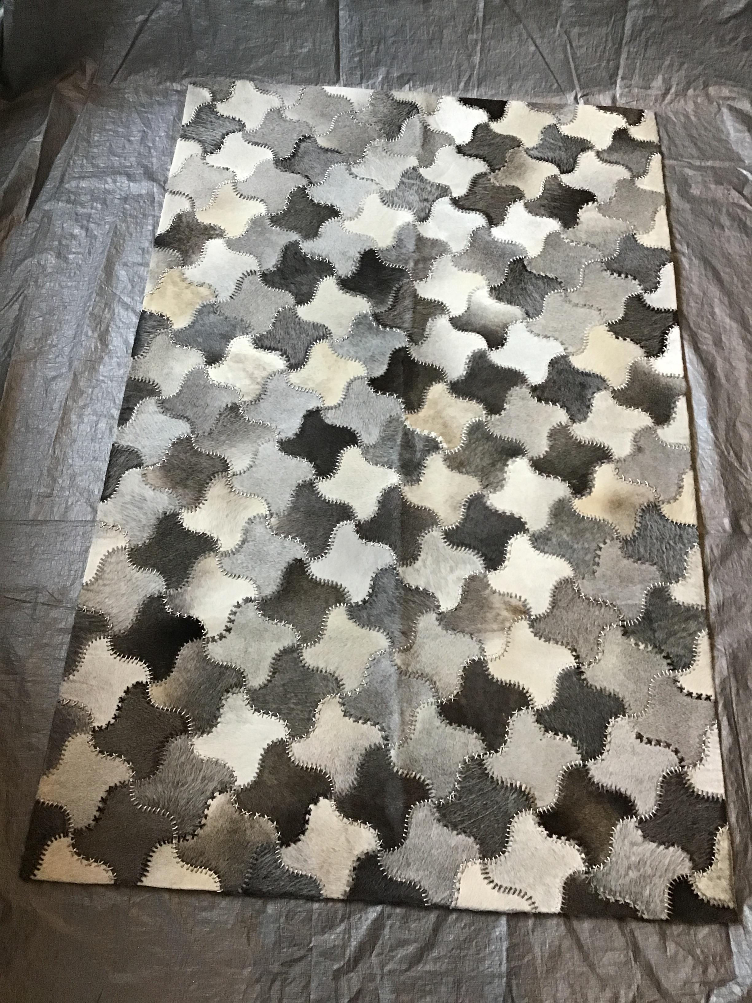 Castelluxe 5 x 8 Stardust design grey, beige, cream, hair on hide rug. Never used.