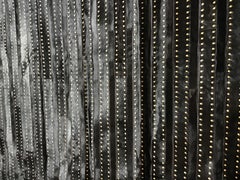 Castelluxe Gemma Design Black Hair on Hide Rug With Brass Tacks