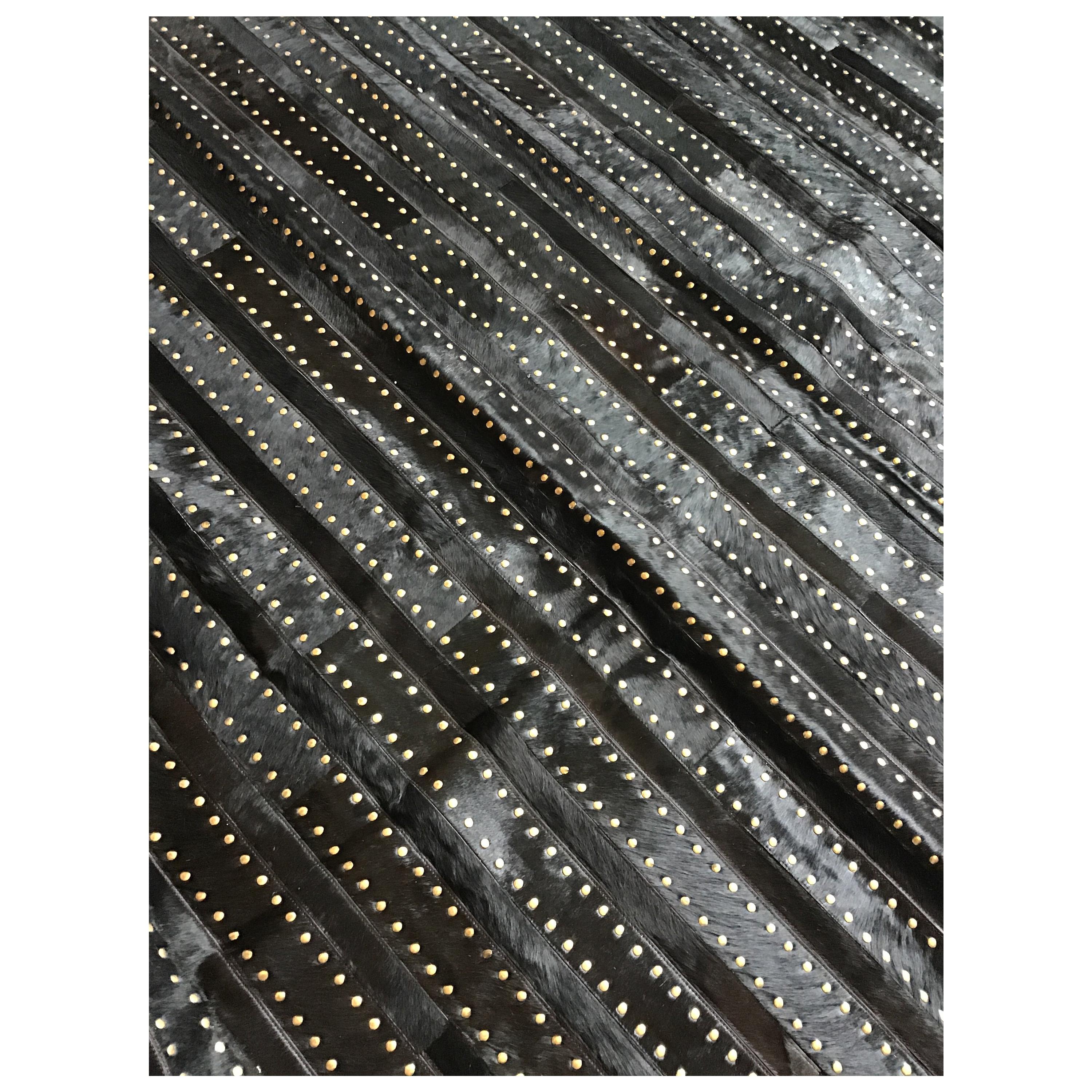 Castelluxe Gemma Design Black Hair on Hide Rug With Brass Tacks