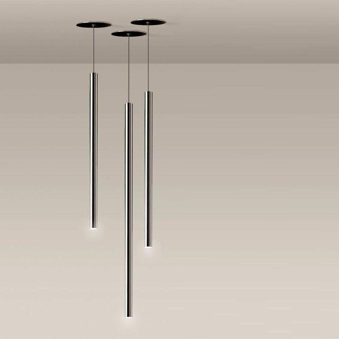 Castiglioni & Menghi canna nuda metal pendant lamp for nemo lighting in chrome.
This beautifully designed minimalistic pendant lamp is masterfully created with integrated LED which emits an elegant and natural glow designed to illuminate any