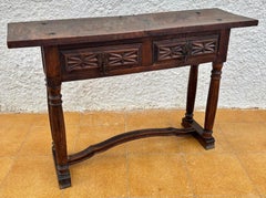 Mesa consola castellana con 2 cajones tallados, años 40