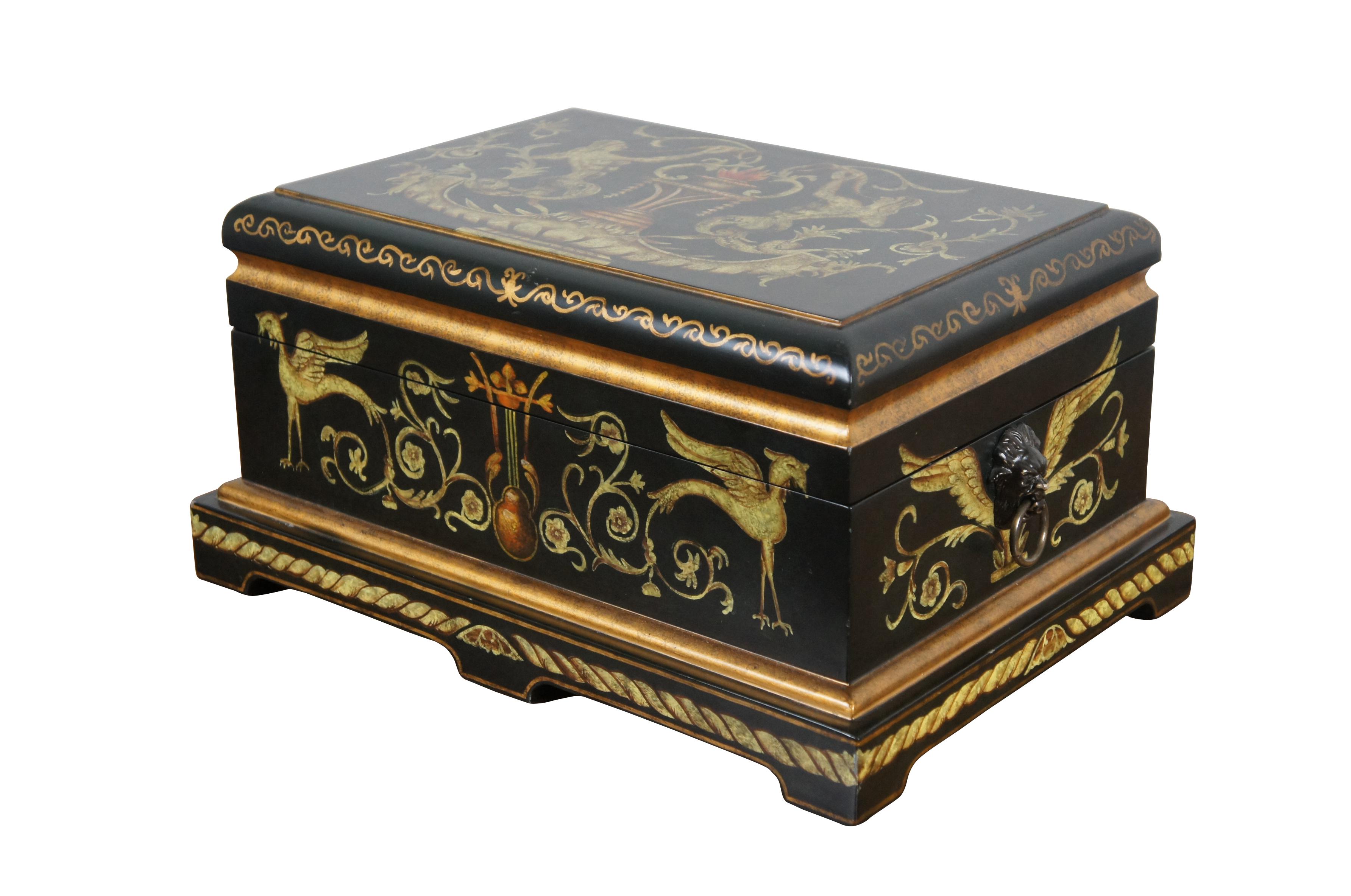 Vintage large trinket / jewelry / keepsake box / casket / chest by Castilian Imports. Item No. 7710. Rectangular form with black lacquer ground gilded with details of Neoclassical inspired griffons, winged lion's head handles and