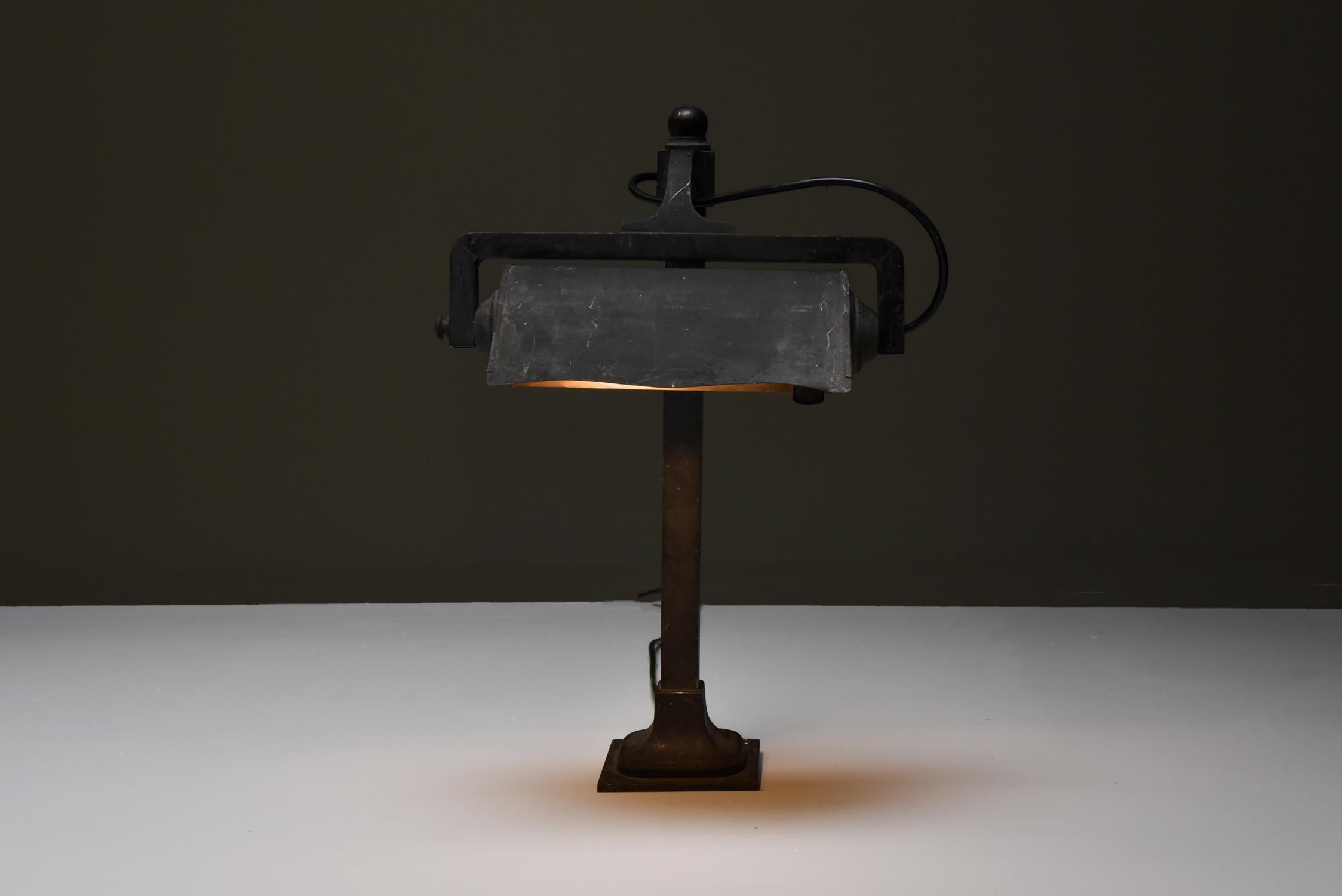 Industrial desk lamp, a pair, castiron, France, 1900s.

in the atmosphere of Yielde, Gras & others
With adjustable shades, so can be used as sconces too.