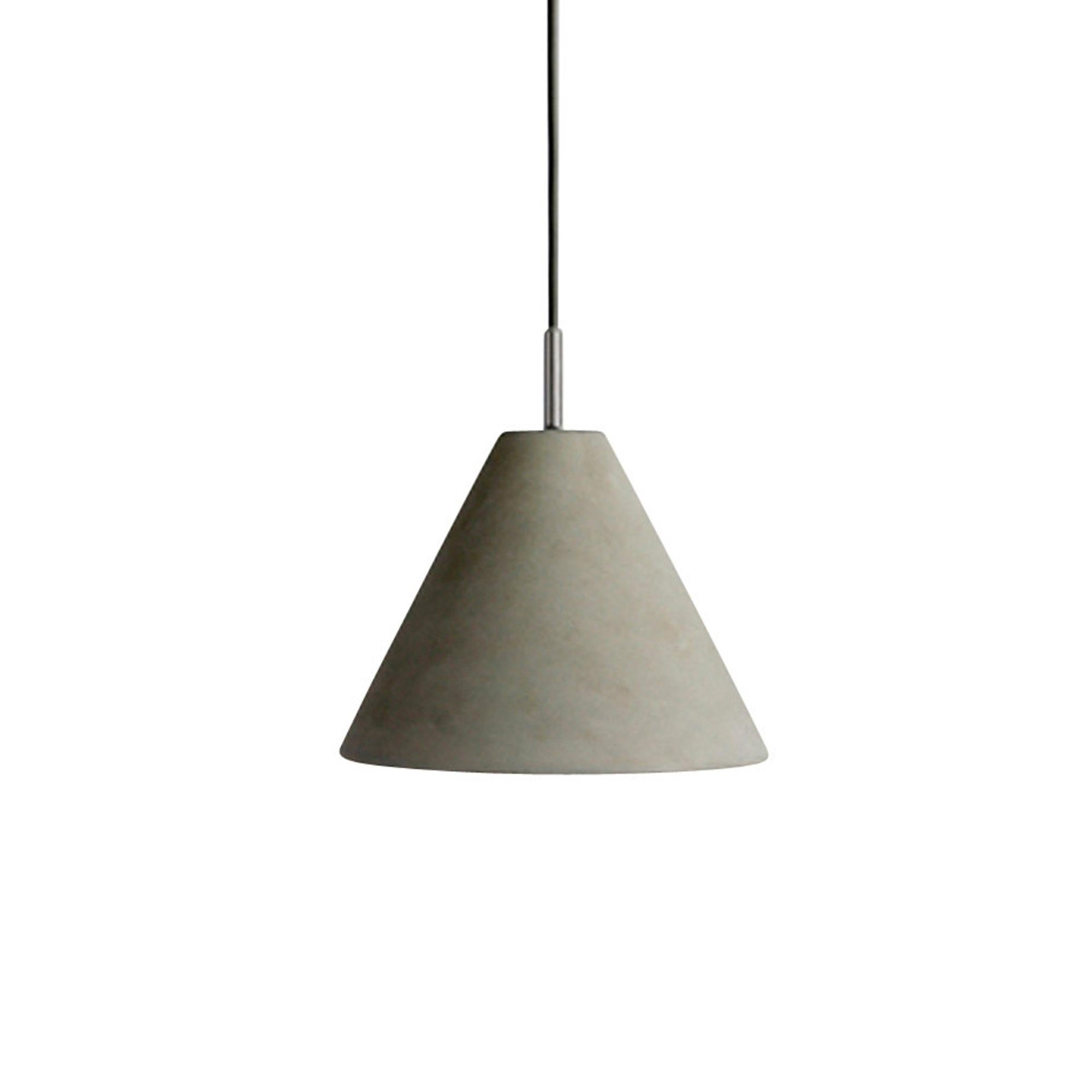 CASTLE CONE Pendant desires to challenge your every perception of texture and lighting. As a material, concrete is exceptionally energy efficient compared to that of metal or glass. By using concrete as a lampshade the CASTLE CONE Pendant has