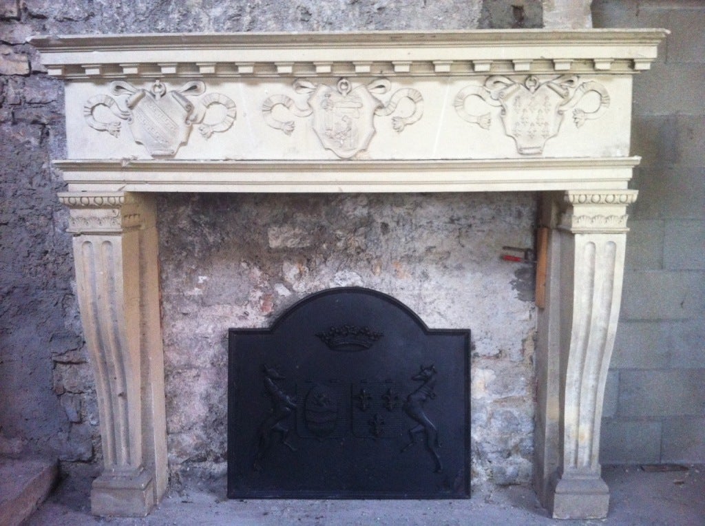 Rare Chateau/castle fireplace Renaissance style 19th century hand-crafted in solid plaster from France.
Beautiful blasons representing 