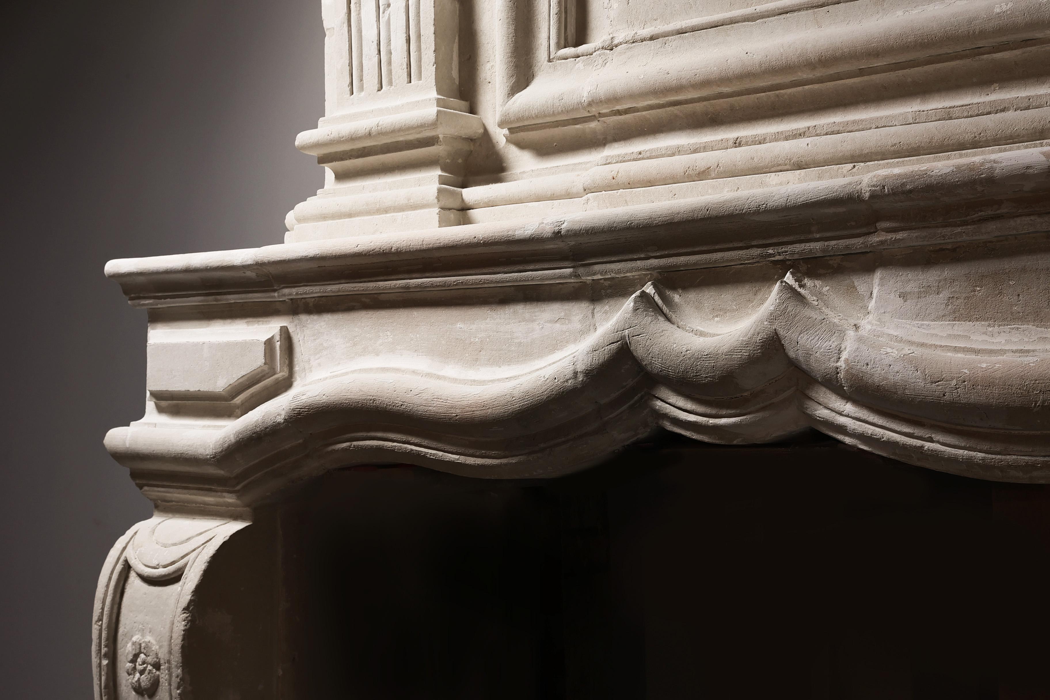 Limestone Antique fireplace with Trumeau For Sale