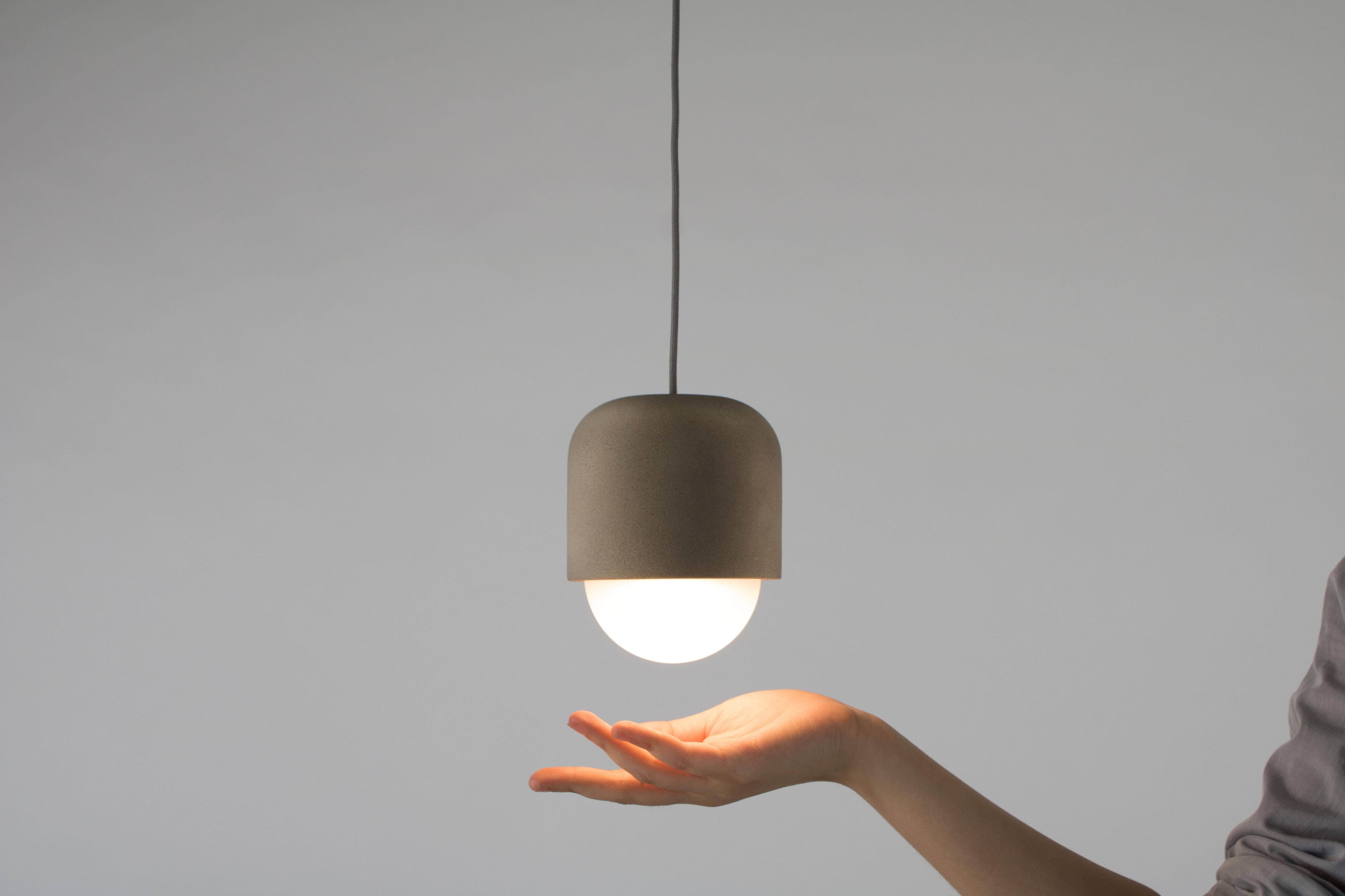 Castle Muse pendant desires to challenge your every perception of texture and lighting. As a material, concrete is exceptionally energy efficient compared to that of metal or glass. By using concrete as a lampshade the Castle has responsibly kept in