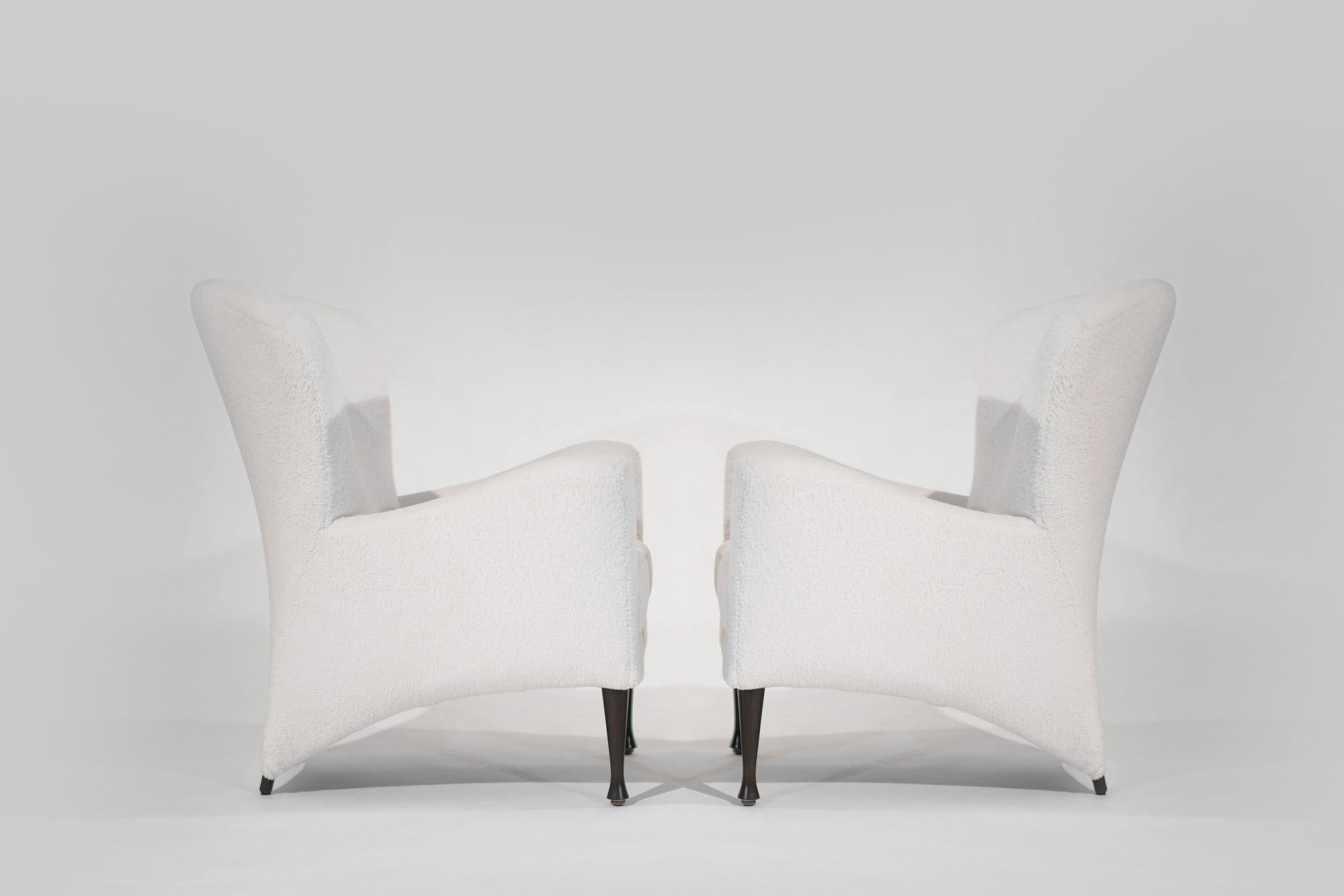 Restored to perfection, this set of Castor Lounge Chairs offers timeless style and comfort. Originally designed by Gijs Papavoine for Montis, these chairs feature a sleek metal frame and have been reupholstered in luxurious wool bouclé. A perfect