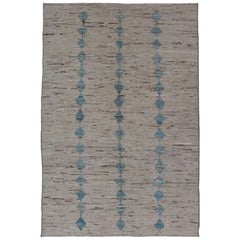 Tappeto moderno e casual nei toni del crema e del blu e dal design minimalista