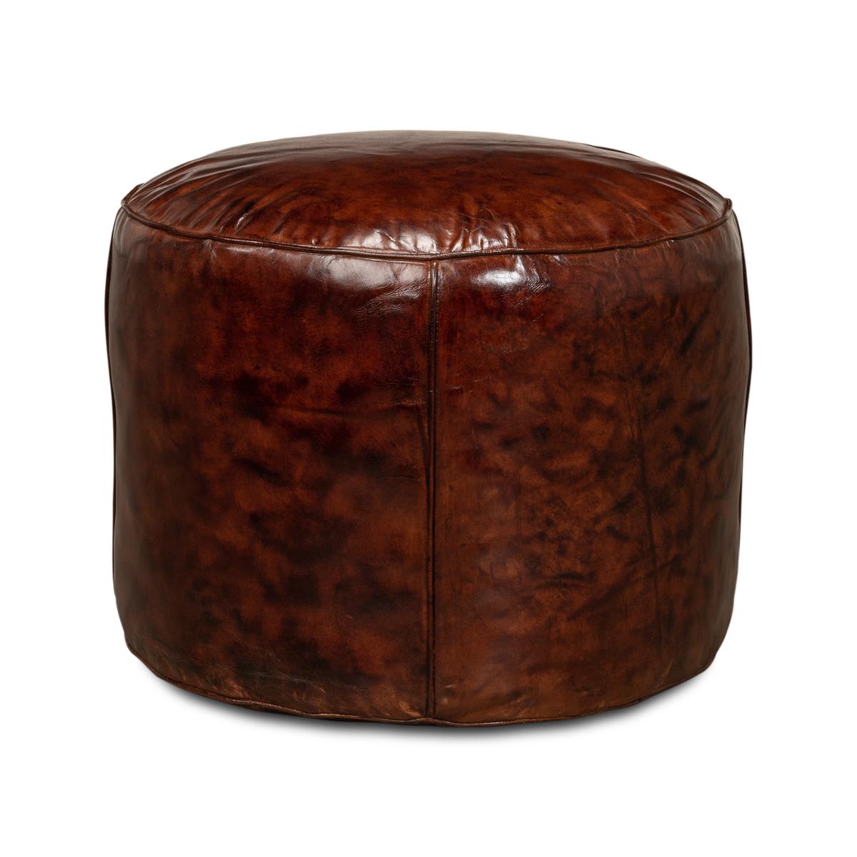 In an antique brown leather, the round stool is an ideal stool to set aside the bed, a chair, or sofa.

Dimensions: 22