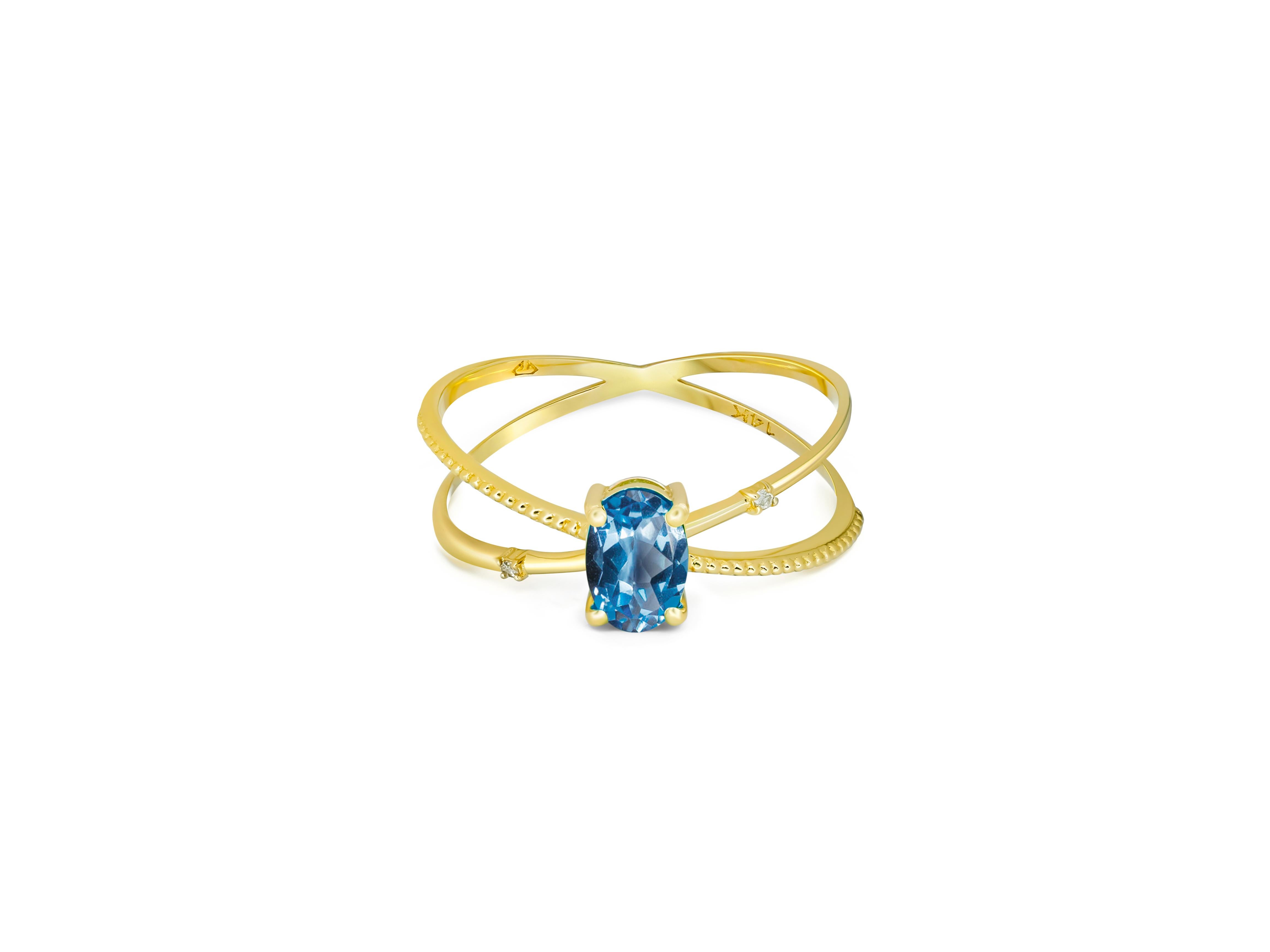 Casual topaz ring. 
Topaz spiral ring. Oval Topaz ring. Sky blue Topaz 14k gold ring. Minimalist Topaz ring. Topaz engagement ring.

Metal: 14k gold
Total weight: 1.9 g  depends from size.

Main Stone: Topaz
Shape: Oval  
Total Carat Weight: aprox 1