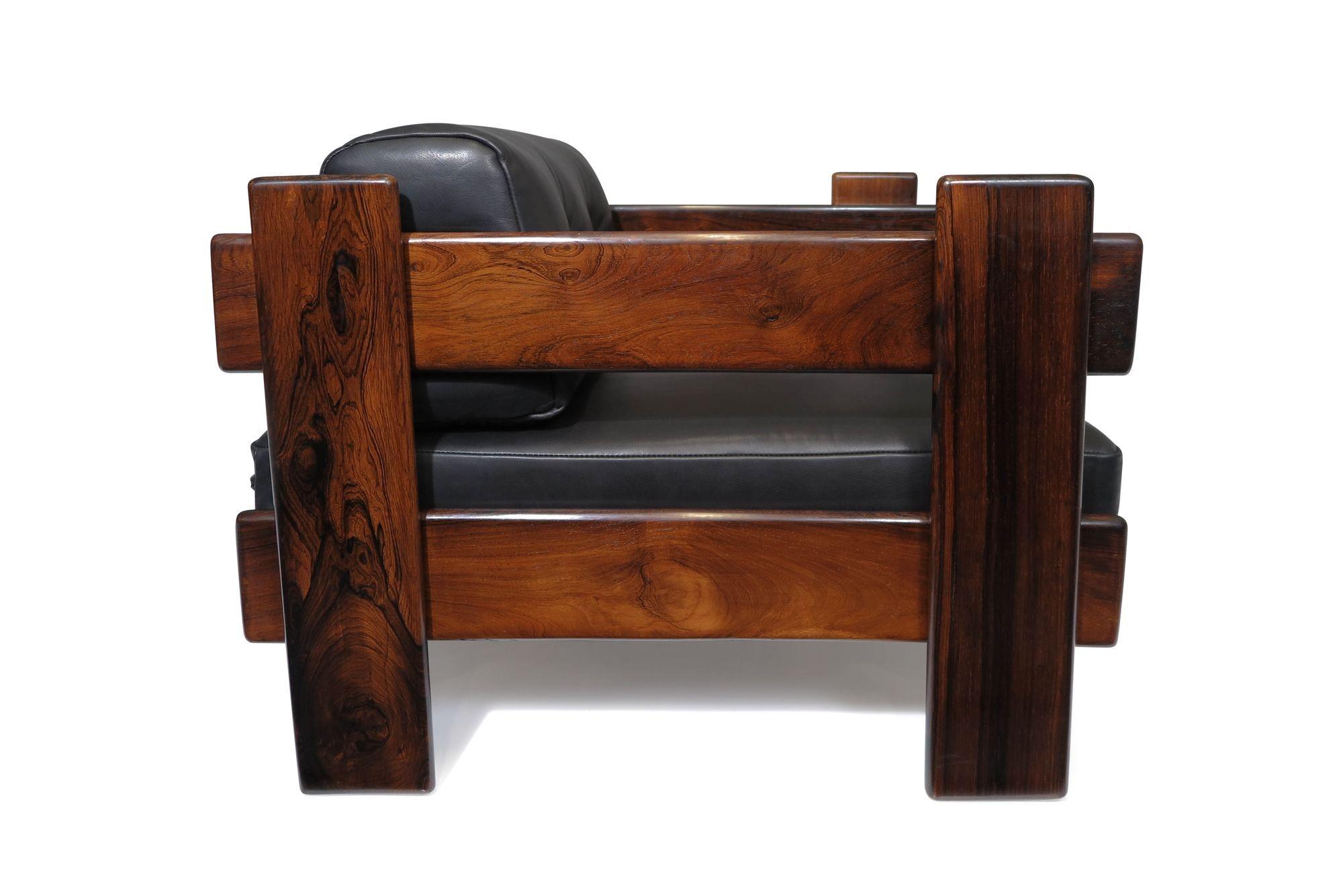 beautiful Mid-century Brazilian modern armchair by Casulo, Brazil, 1960's. The chair is handcrafted with a slatted structure from planks of solid Brazilian Rosewood and has been reupholstered by our master upholsterer. The leather used is soft,