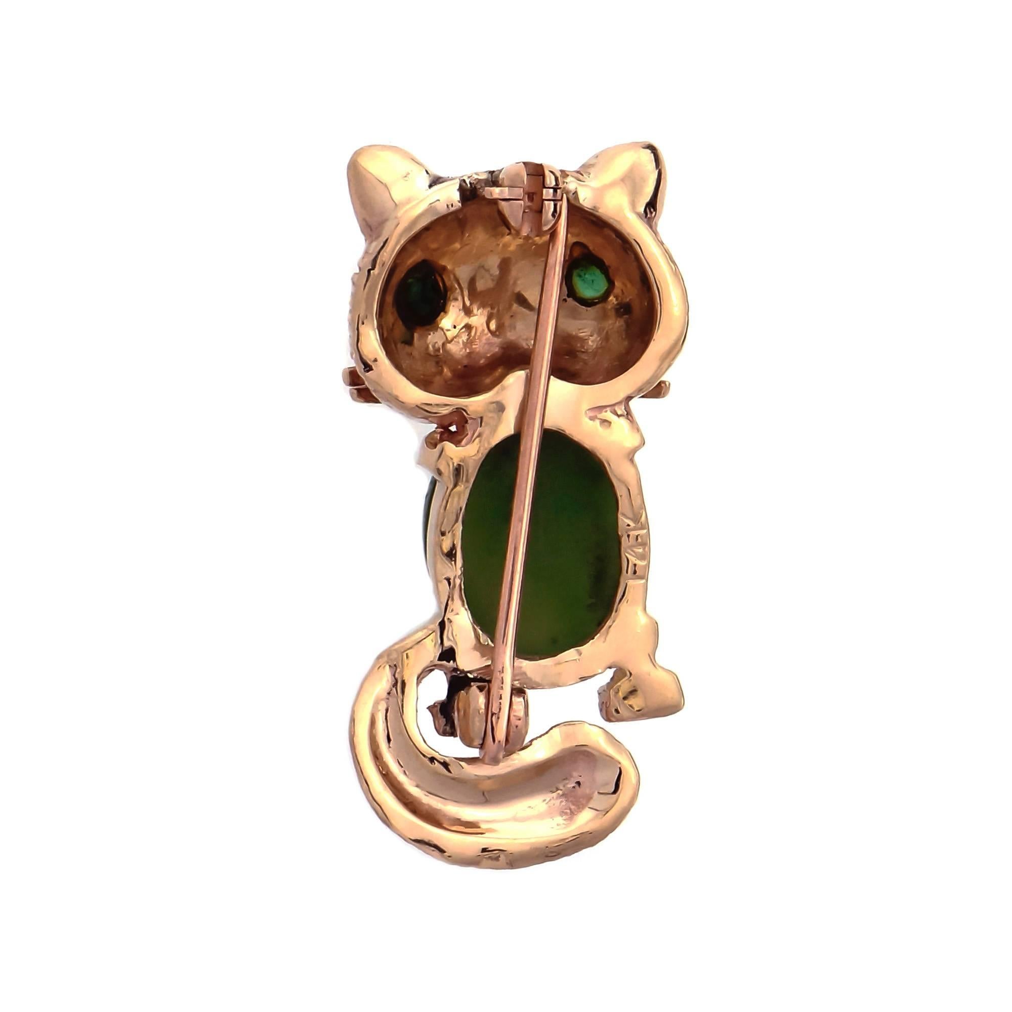 Brooch & ring. 3-piece set consisting of a Ruby & black enamel frog pin, an owl pin with Jade, Emerald & Ruby and a custom-made ring base in 14k yellow gold. The 2 animals can be worn as brooches or made into animal rings by attaching the pin to the