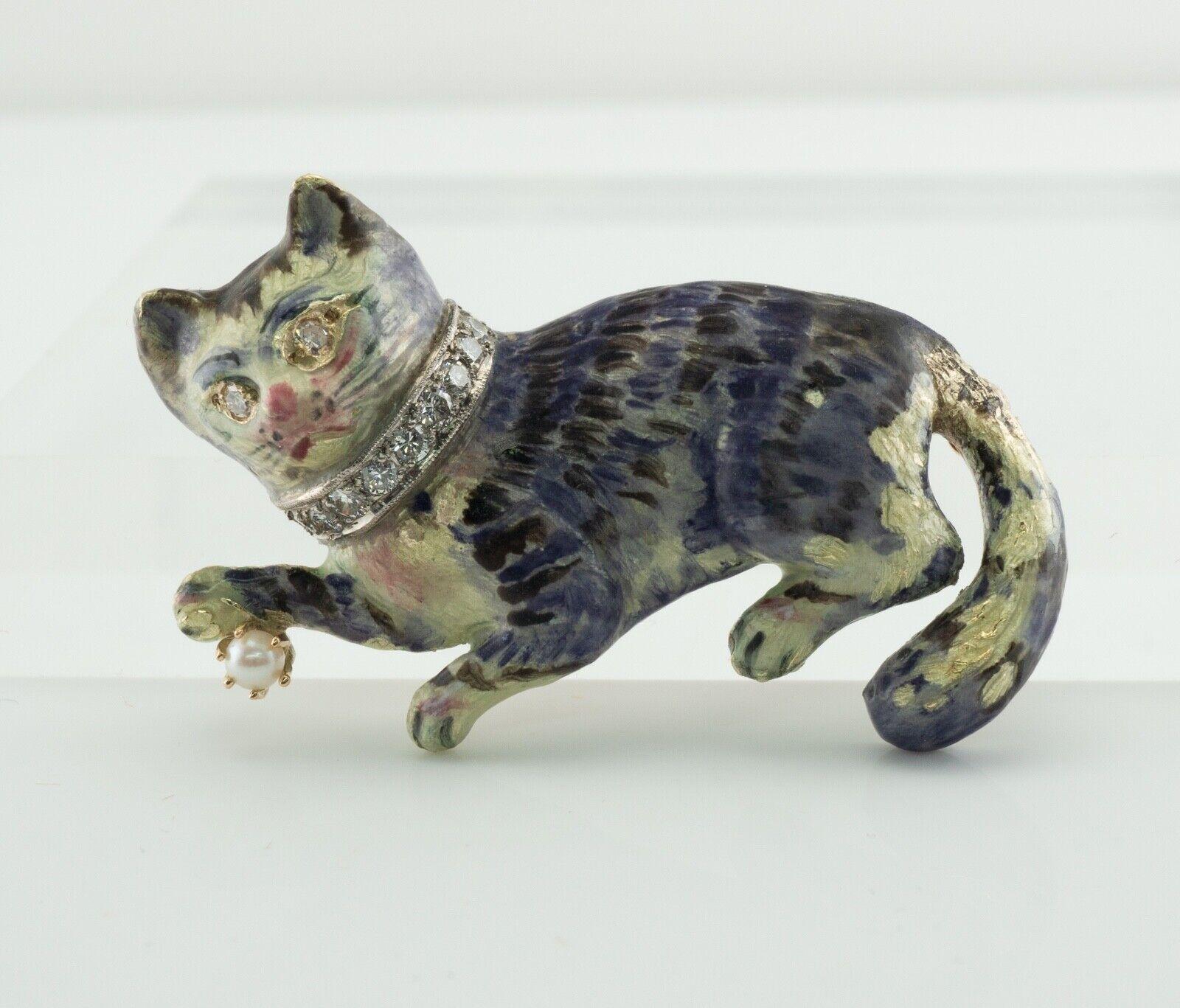 Cat Brooch Diamond Pearl Enamel Pin 14K Gold

This stunning vintage brooch / pin is finely crafted in solid 14K Yellow Gold (carefully tested and guaranteed) in the shape of a lovely cat. 
Its body is covered with a good condition enamel. 
Two