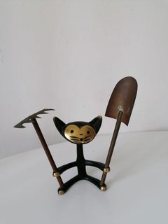 Cat Figurine with Shovel and Rake by Walter Bosse