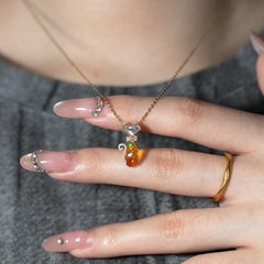 Collana con opale Cat's Eye, pietra di luna e diamanti in oro giallo 14k