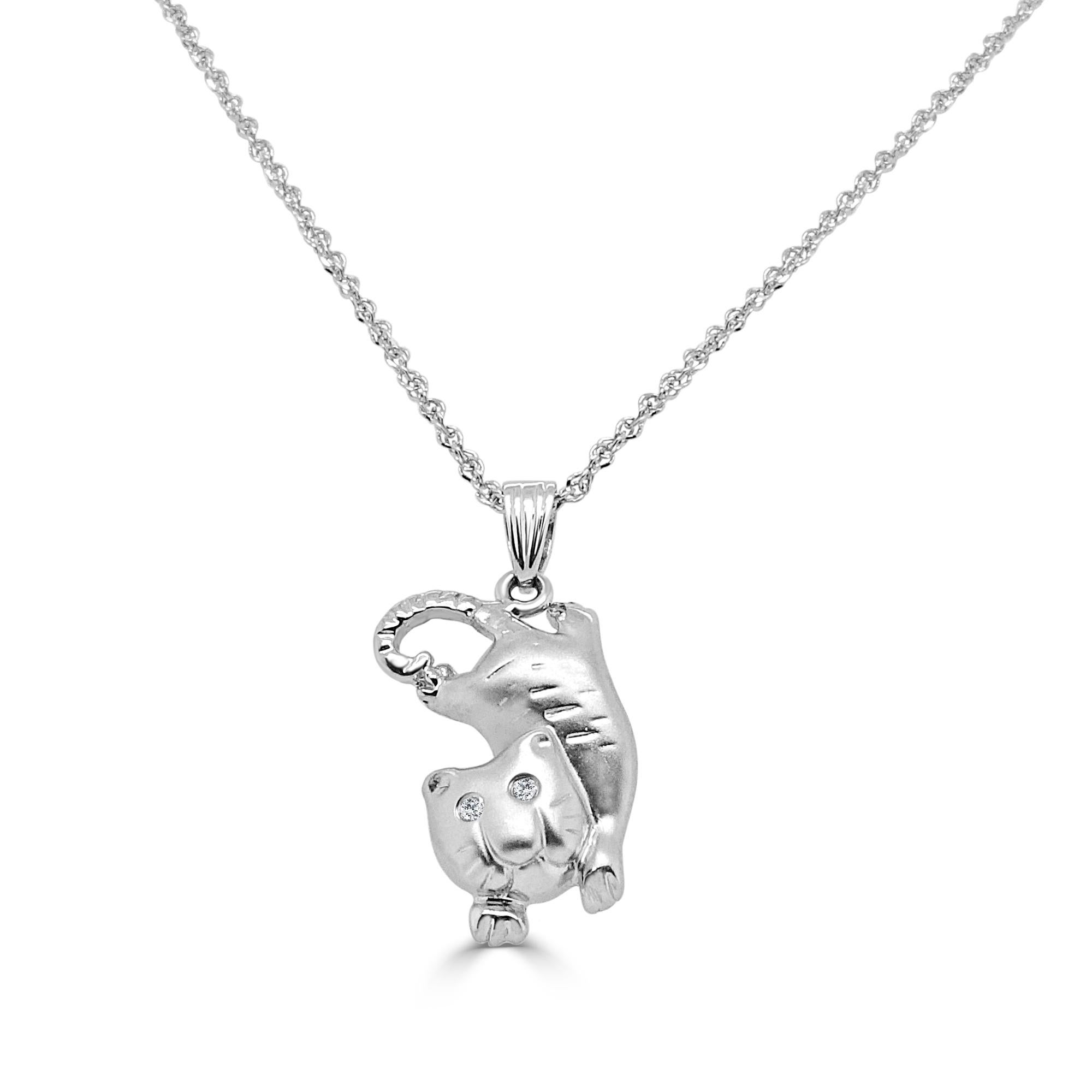 18 Karat white gold ladies necklace with pendant in the shape of a cat.Gentle and elegant pendant is crafted in a sleek white gold. Featuring round cut diamonds, together totaling 0.01 TCW . Suspended from a 16-inch stunning non-tangle, non slip