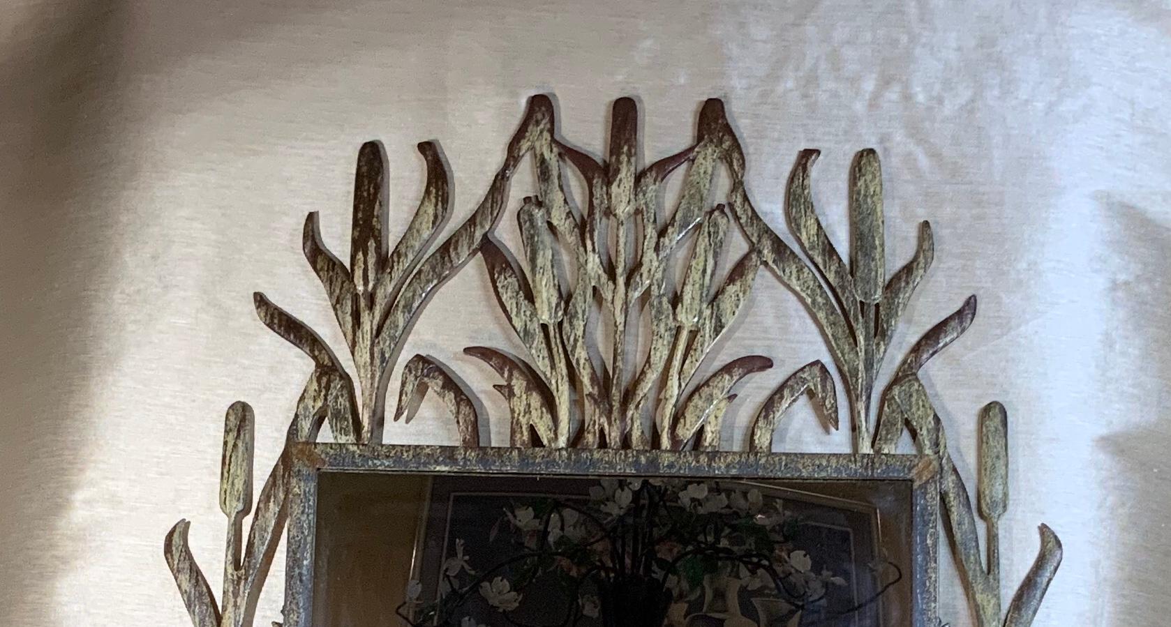 Exceptional mirror made of iron, unusual cat tail motif beautifully enhanced patina treated for rust. Beautiful object of art for wall display.
Mirror size only: 22”.5 x 28”.5.