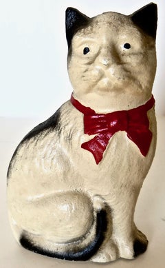 "Cat With A Bow Seated" Still Bank, American, circa 1970