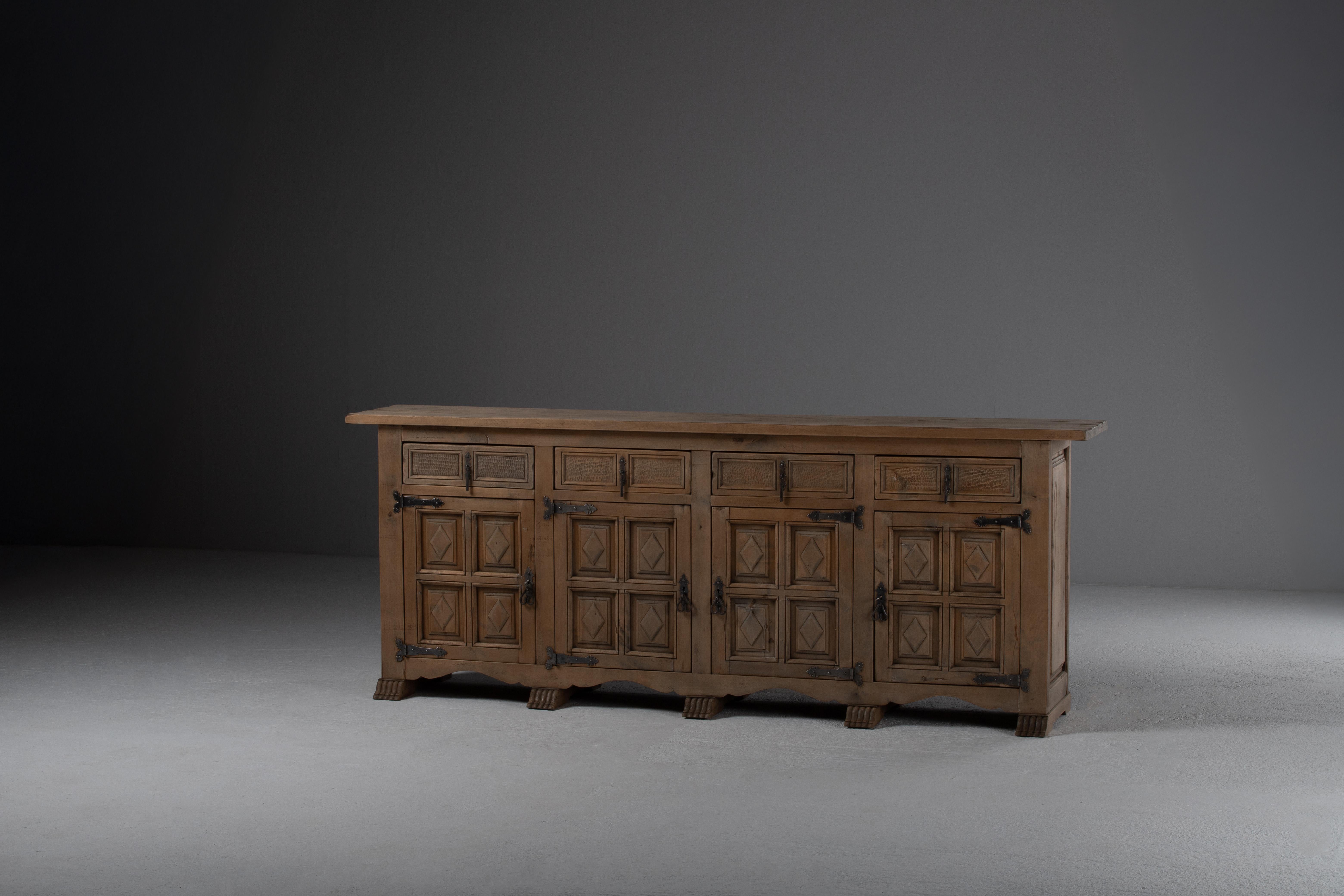 Spanish Colonial Catalan Carved Walnut Sideboard, 1940s For Sale