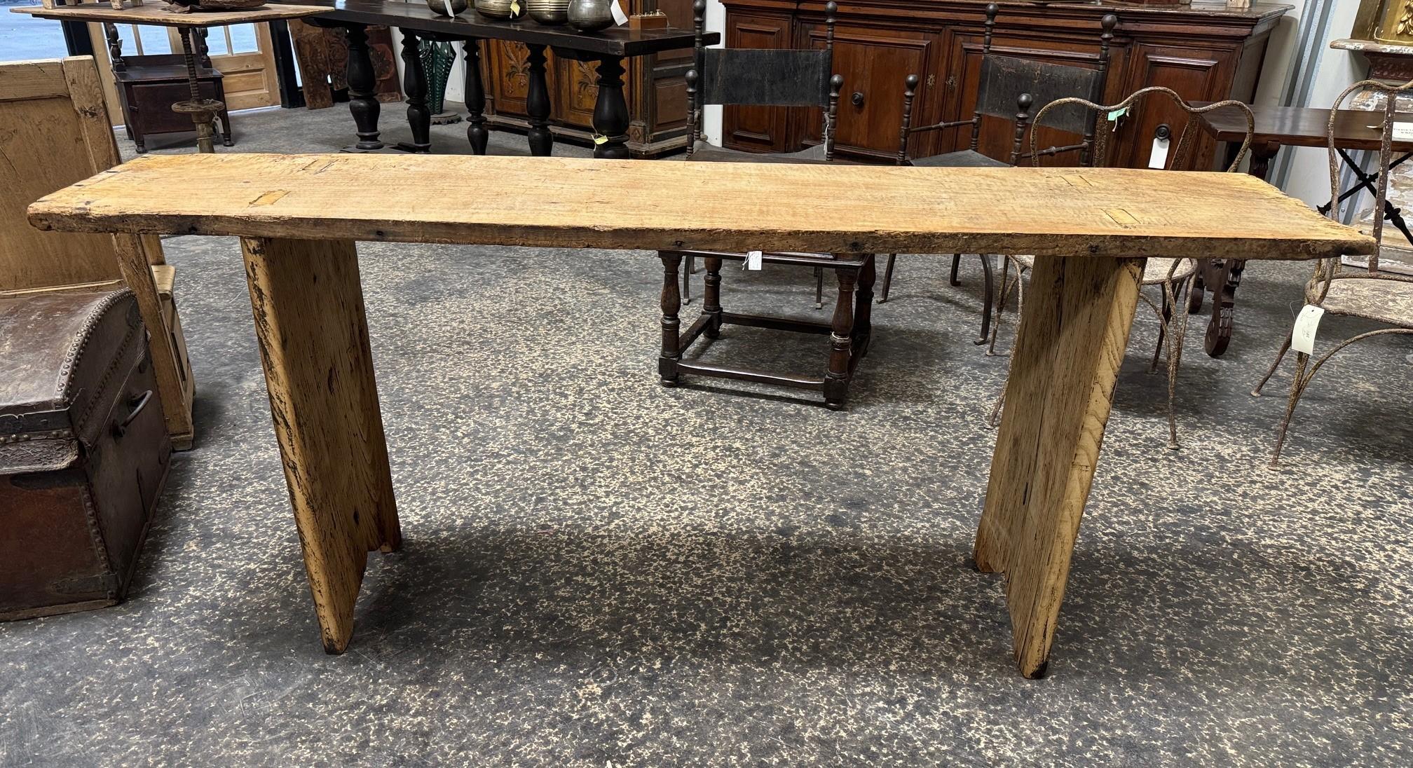 A very handsome console table from the Catalan region of Spain.  Beautifully constructed from solid boards of 17th century chestnut.  Wonderful patina.  Its minimalist lines lend this console a very contemporary feel.