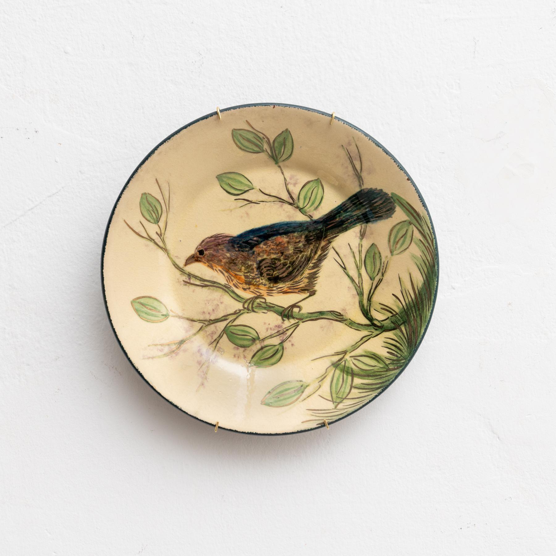 Piatto in ceramica dipinto a mano dall'artista catalano Diaz Costa, 1960 circa.  Arricchisci la tua esperienza culinaria con questo splendido piatto tradizionale in ceramica dipinto a mano dal famoso artista catalano Diaz Costa, circa 1960.