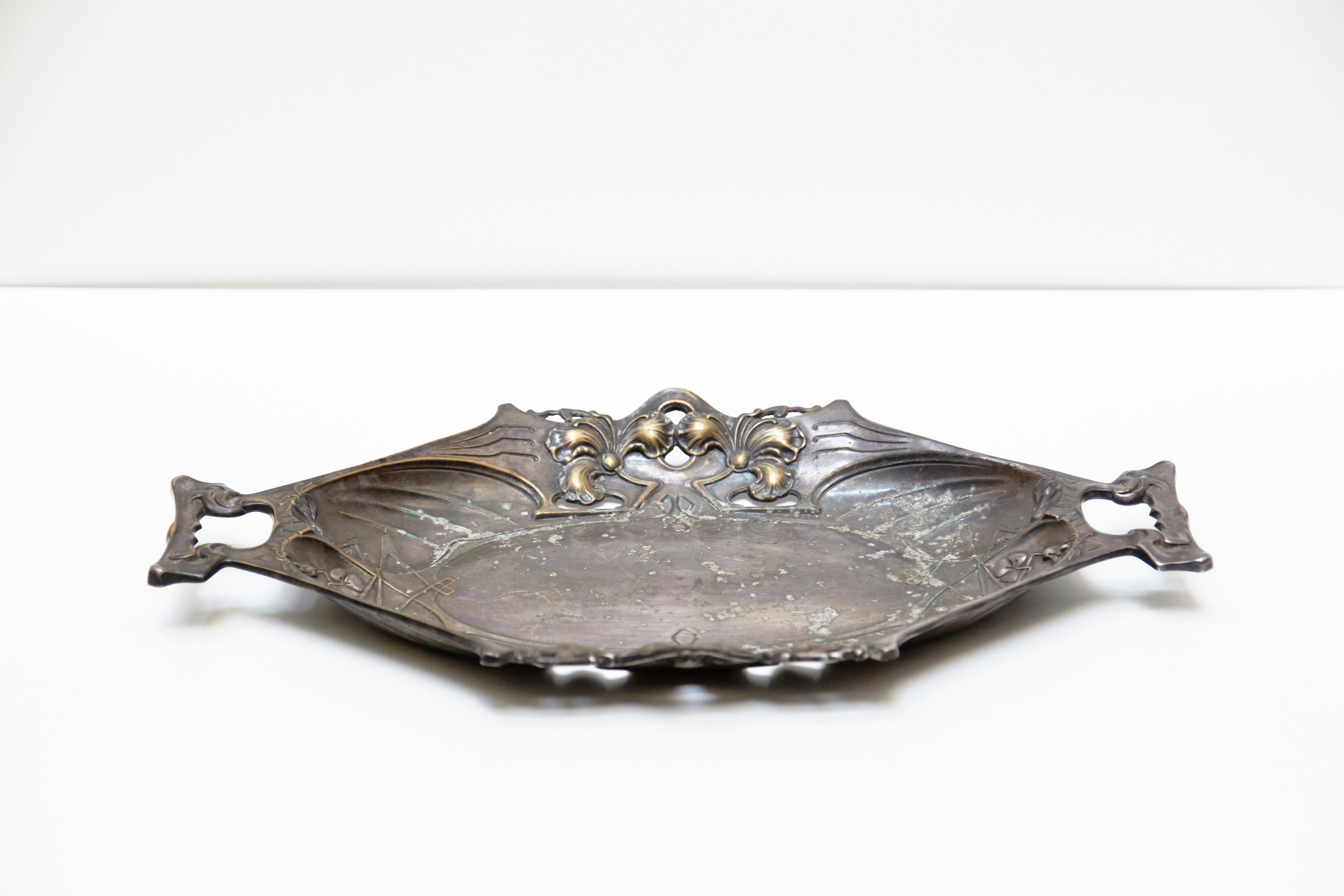 Catalan modernist pewter tray from Barcelona, circa 1920

Catalan modernist pewter tray.
Manufactured in Barcelona, circa 1920.

In original condition with minor wear consistent of age and use, preserving a beautiful patina.

Measures: 4 H x