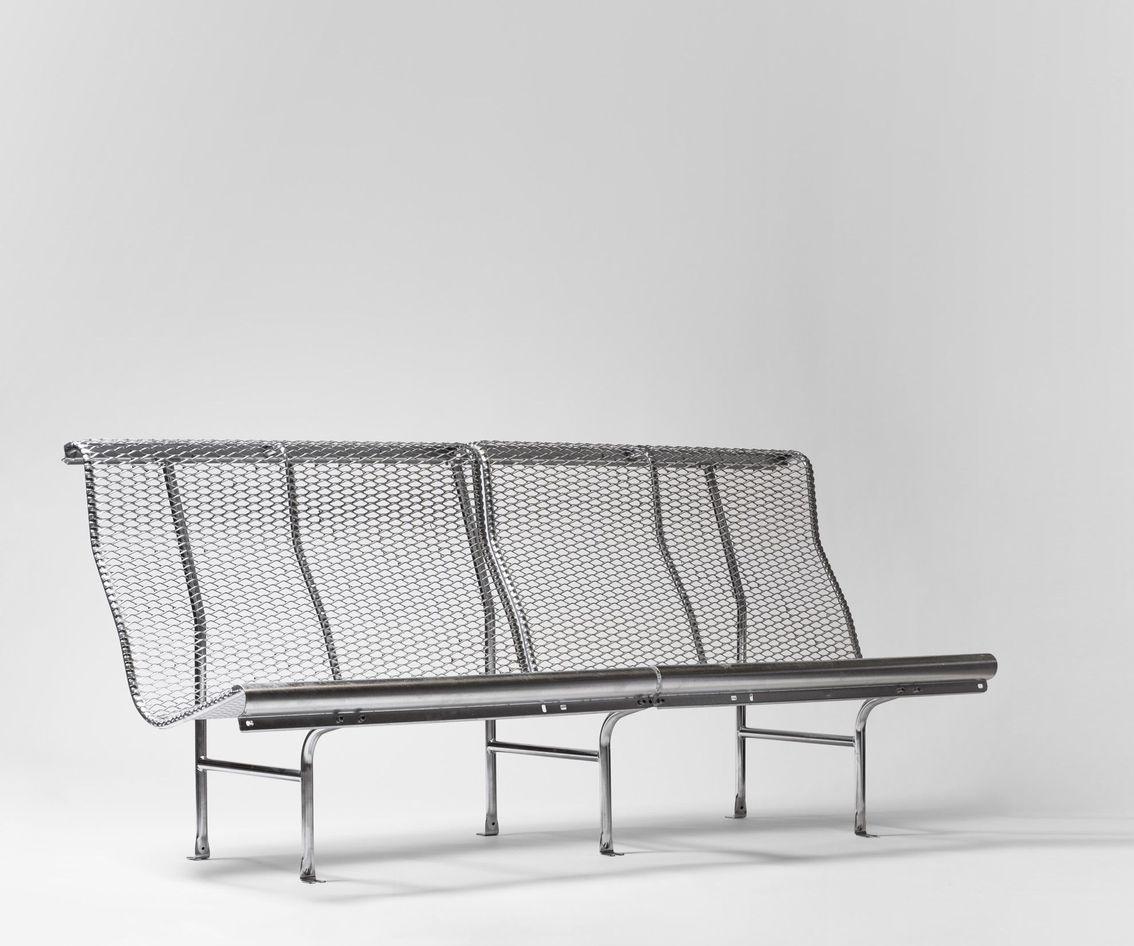 Catalano bench by Oscar Tusquets & Lluis Clotet
Dimensions: D 76 x W 100 x H 90 cm 
Materials: Tubular steel seating in deployé and hot-dip galvanized. Additionally, the galvanized deployé can be painted over with a silver-colored polyester resin.