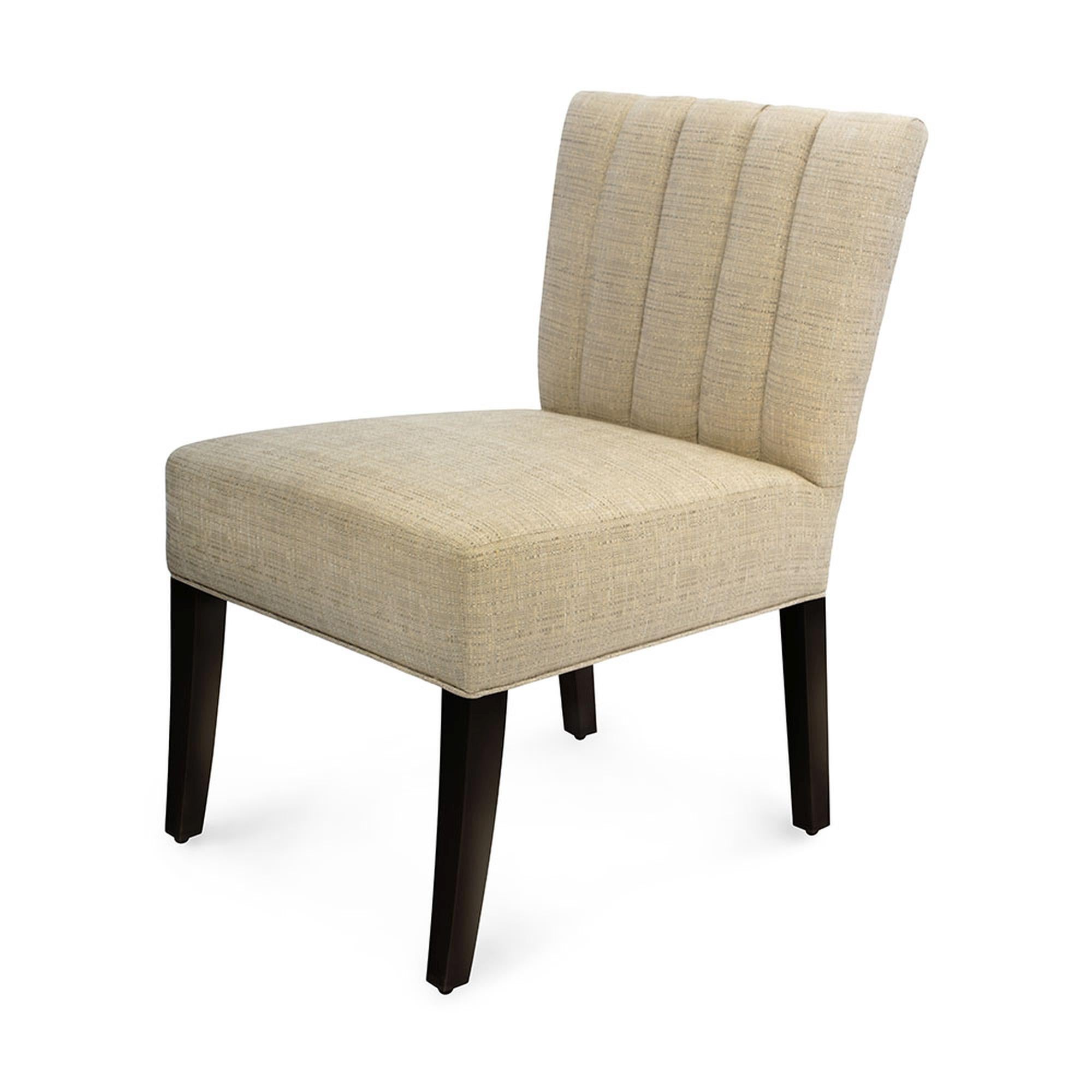 Classic design meets contemporary luxury with the Catalina desk chair. Plush and fully upholstered, this chair softly complements the Catalina desk. Featuring a channel tufted back cushion and down wrapped foam seat, this desk chair is as