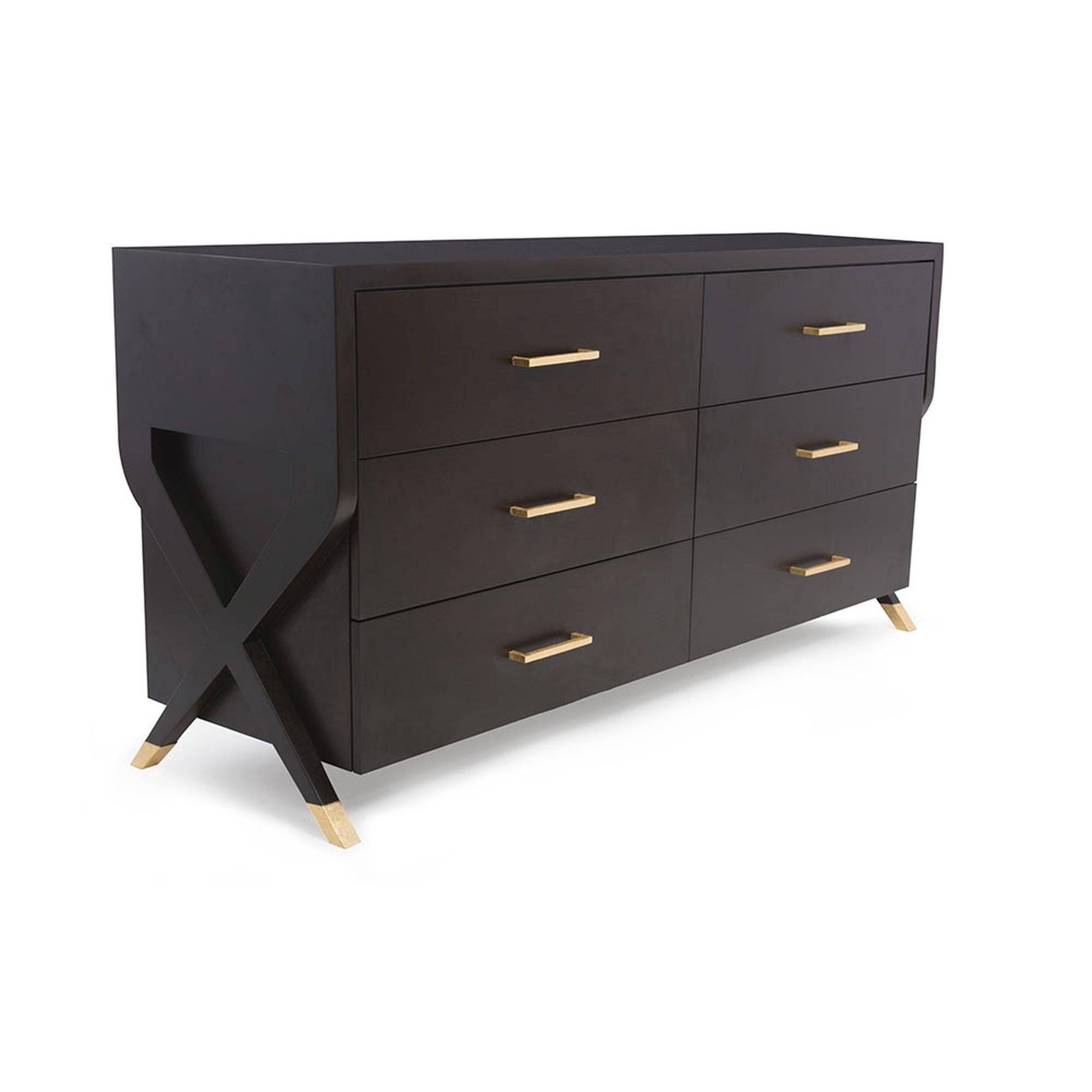 Modern elegance perfected, with the Catalina dresser. Its sleek and chic silhouette adds a sophisticated look to any bedroom. The two legs at each side, across to form an “X” across the body of the piece, and are delicately adorned with a metal