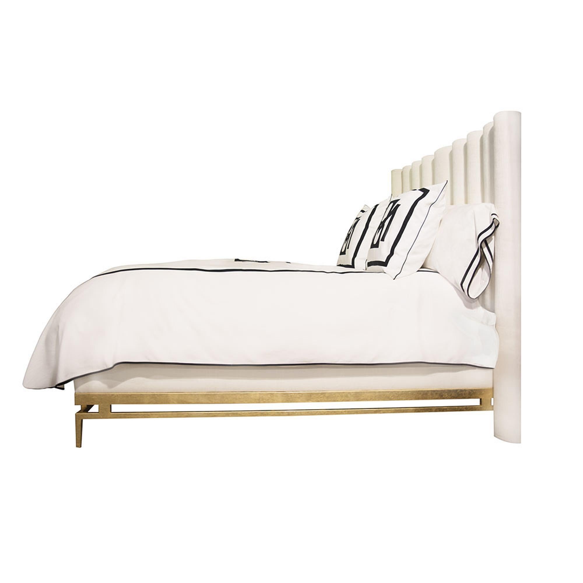 white and gold king bed