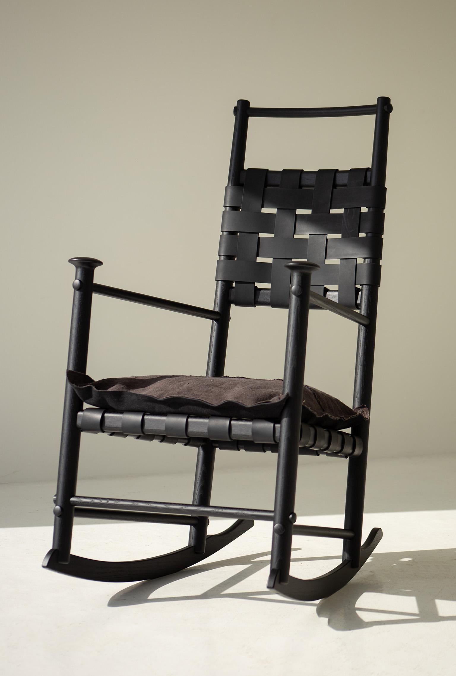Catawba rocking chair, Modern leather rocking chair, black, for Craft Associates

This Catawba Rocking Chair for Craft Associates® Furniture are expertly crafted. The sides tables are constructed from solid hardwood by hand, not machine. The oak