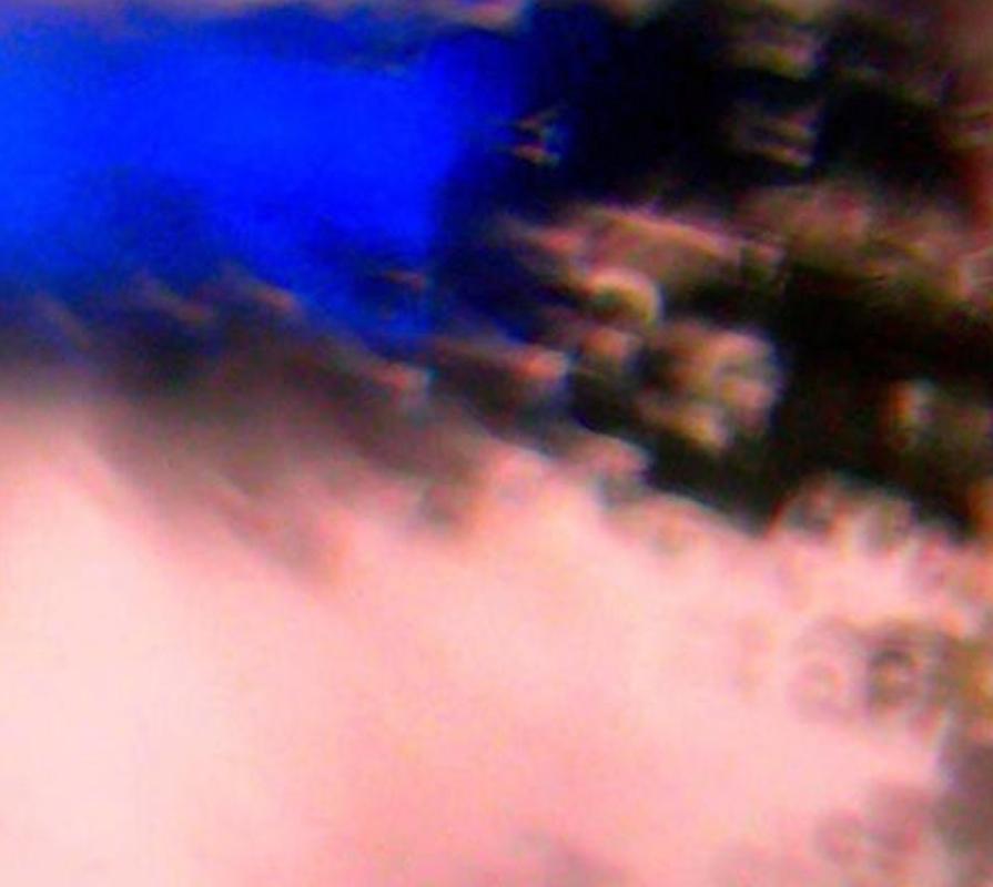 “Blue Notes”,  photographs brilliant  blue reflections in pink sunset light - Abstract Photograph by Cate Woodruff