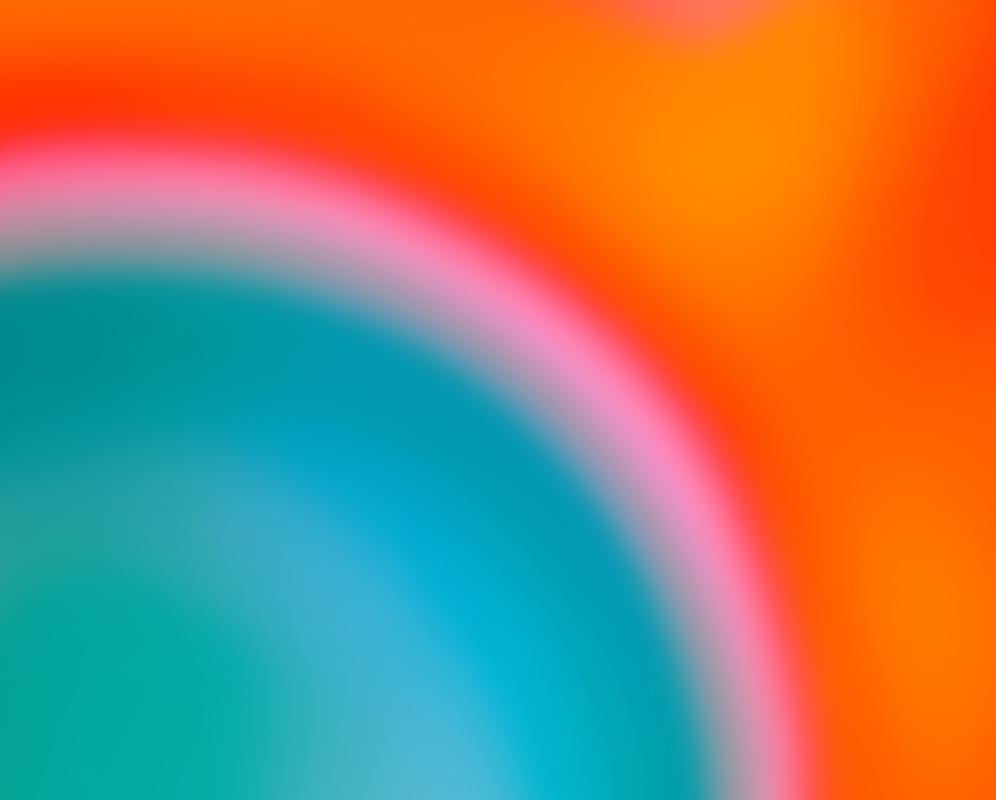  “Orb”, a pulsing turquoise circle surrounded by rings of pink and orange - Photograph by Cate Woodruff