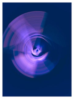 "Spin", a spiraling swirl of purple and violet light, photogaphs pure color